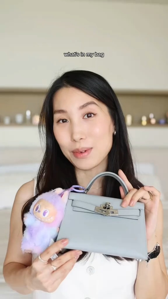 What’s in my mini bag: @Clarins USA Lip Oil for on-the-go hydration, Purcell mist for that dewy glow, Touchland sanitizer (always), Haus Labs blush in my go-to peachy shade, and the usual—cards + cash. Just the essentials. 

 #LTKBeauty #LTKItBag