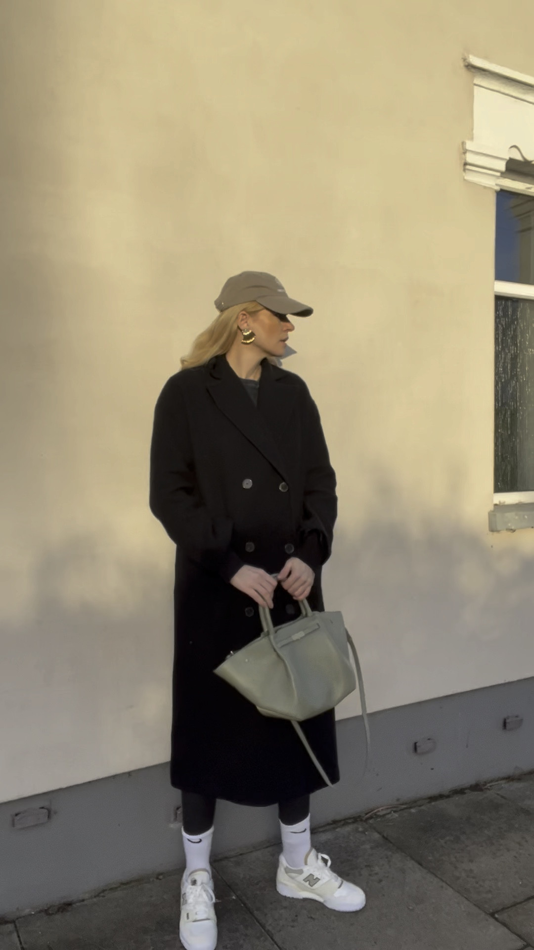 Smart casual outfit, new balance 550, the New York tote, black coat, anime bing cap, wet look leggings 

#LTKVideo #LTKeurope #LTKover40