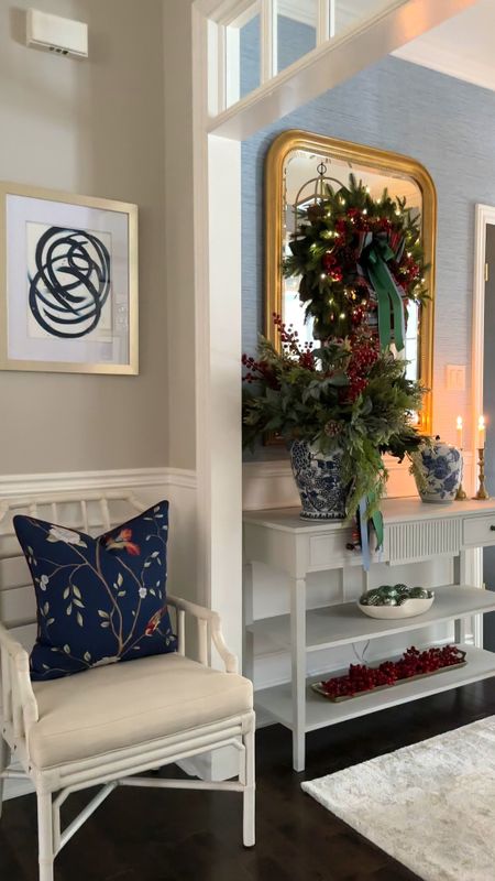 Our entryway decked for Christmas! Gorgeous, full and lush greenery, wreaths and garlands! Add a pretty bow and red berries for a chic, festive look!

#LTKHoliday #LTKSeasonal #LTKhome