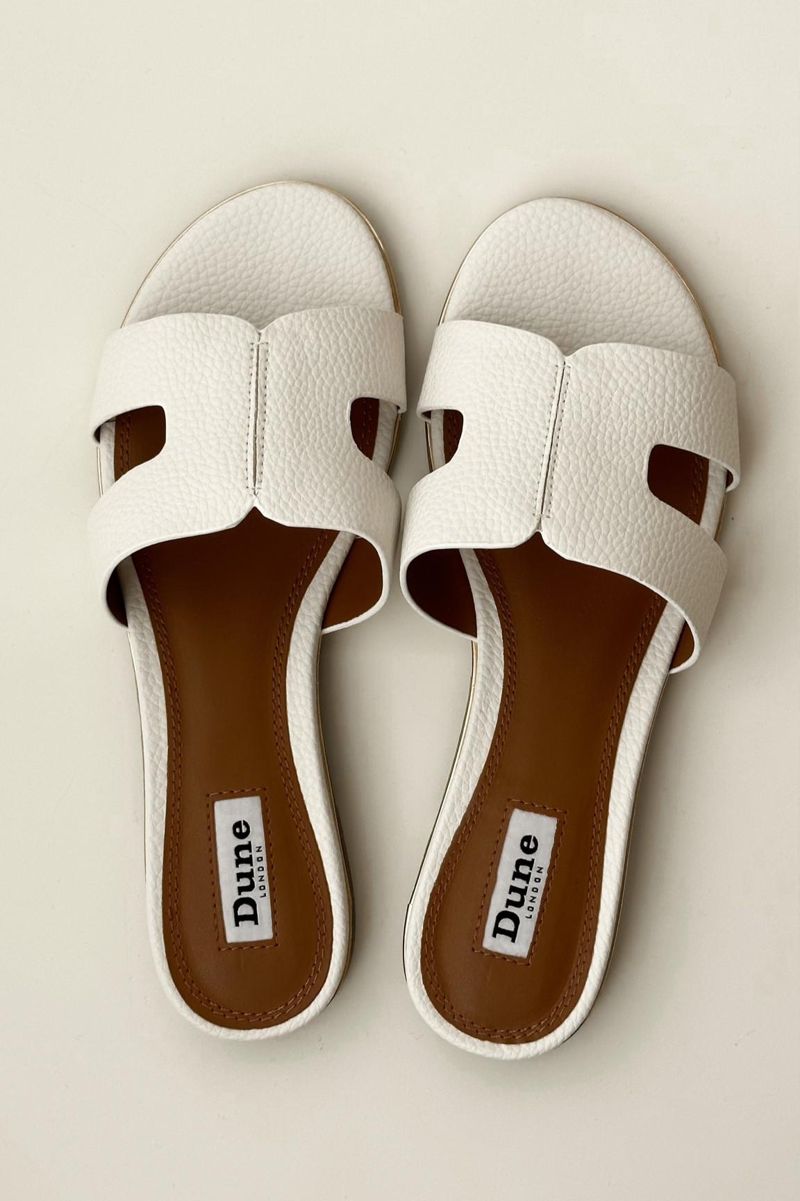 Summer essentials, dune London, White slip on, White sandals, Hermes sandals dupe, summer sandals, sale alert, elegant style, chic and minimal, White summer shoes 

#LTKsalealert #LTKunder100 #LTKshoecrush