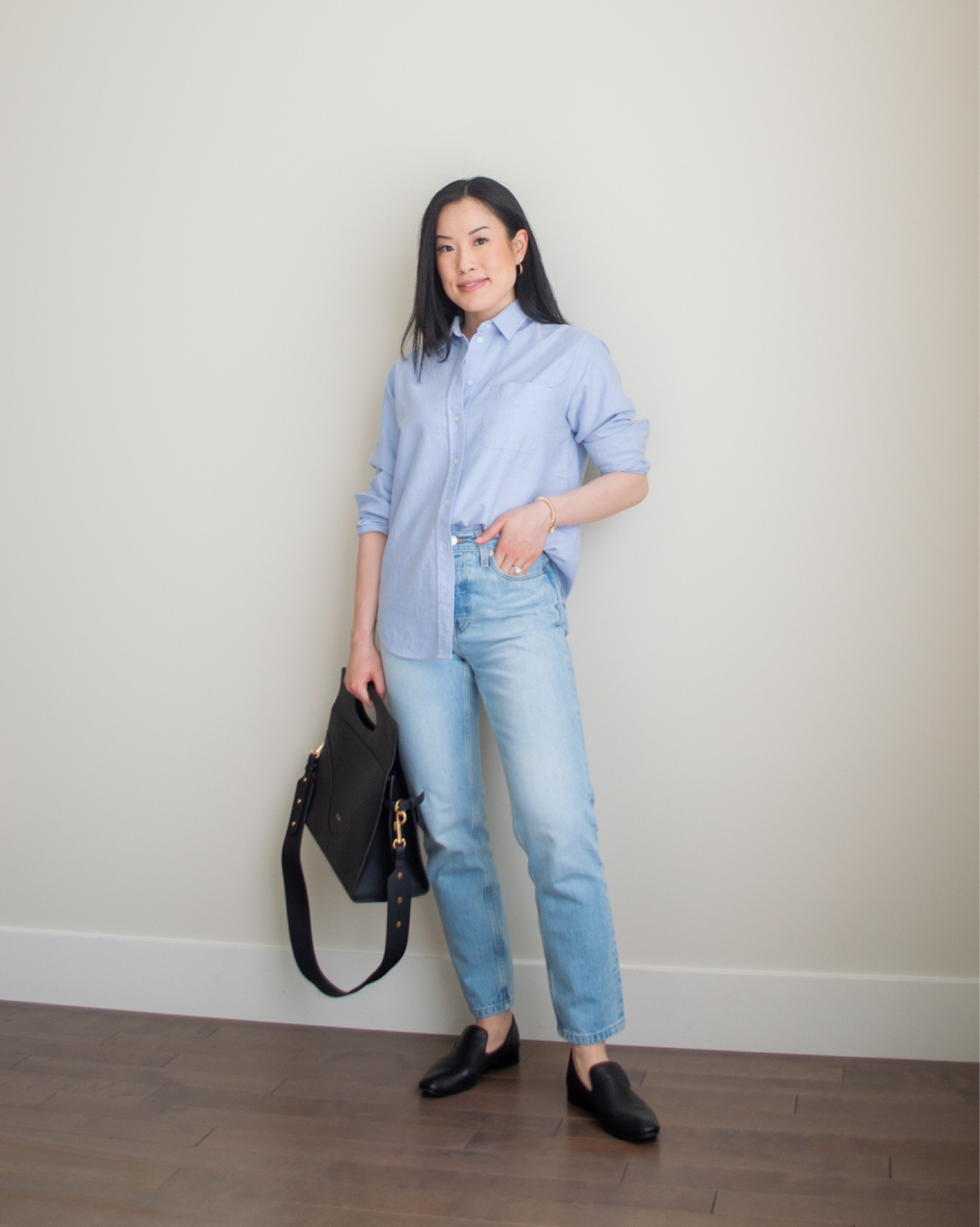 Smart casual capsule wardrobe outfit 6 - smart casual outfit featuring a relaxed Oxford shirt, blue light wash straight leg jeans, classic black loafers, and a briefcase-inspired bag.

Everlane shirt 2, Everlane jeans 24 and 26.5” inseam, Poppy Barley loafers TTS

Unavailable to link: Oleada Captain Briefcase, Sheena Marshall Jewelry necklace

#LTKSeasonal #LTKstyletip #LTKfit