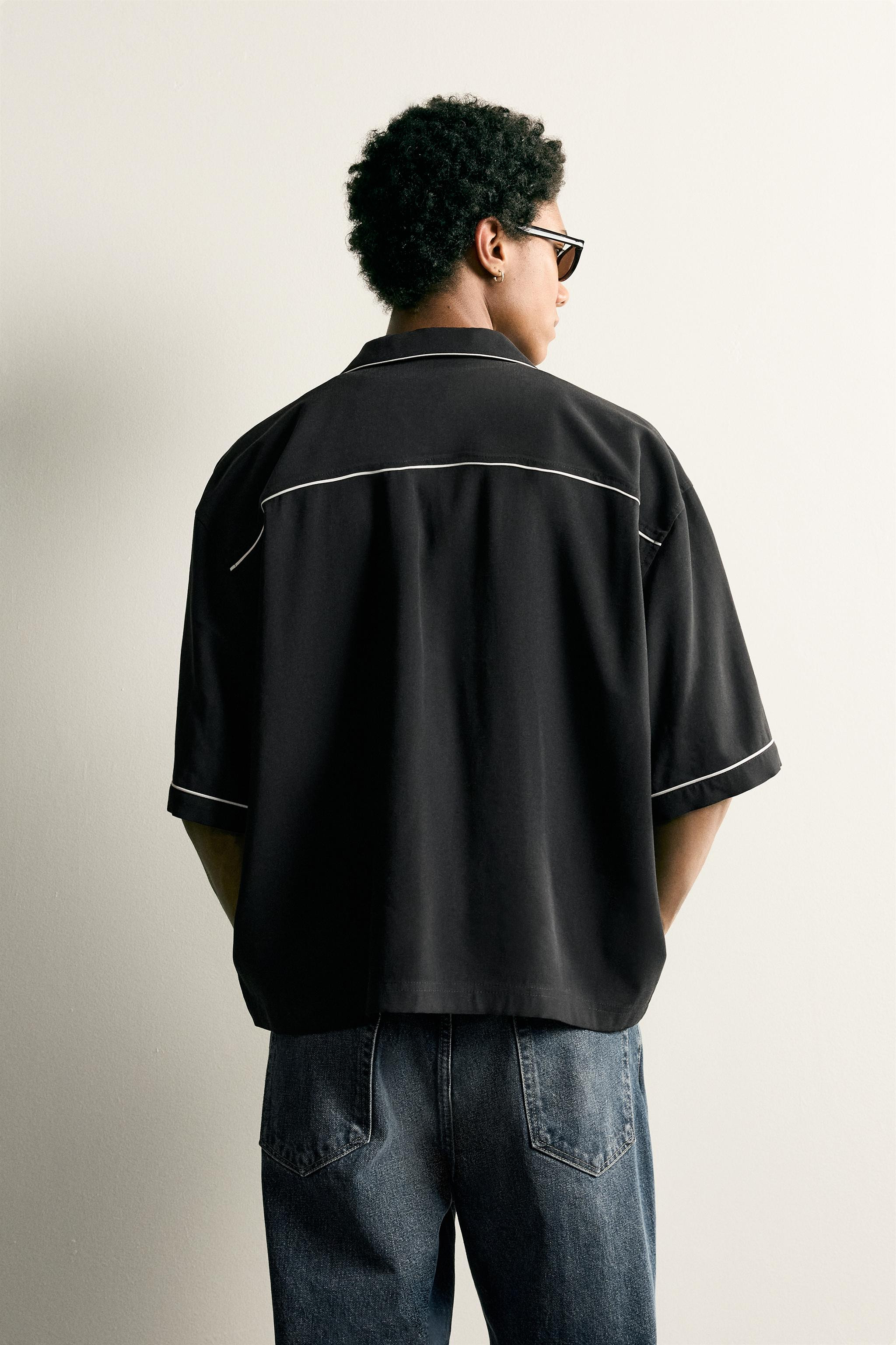 Model height: 189 cmRelaxed fit shirt crafted from fluid viscose blend fabric. Featuring a regula... | Zara UK