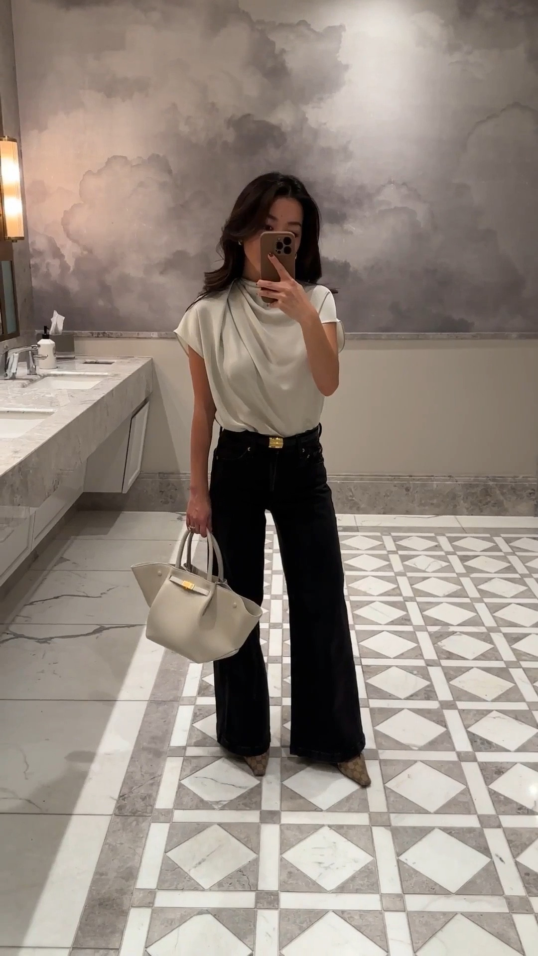 If you liked the quince jeans I shared recently, these Gap ones are very similar and super flattering, and now on sale for under $50!

• jeans size 24 petite in Washed Black. The gap petite Stride jeans have a slightly longer inseam than the 28” quince jeans , so I wear with heels.

The Stride jeans do also come in ankle style - I also have 24 regular ankle (not petite) which works well with flats and sneakers. 

• Edited Pieces mini equinox belt xxs (EditedPieces.com)

• Aritzia Satin Blouse XXS. timeless blouse with elegant asymmetrical drape. Roomier fit with lightweight fabric that drapes and tucks in fluidly. 

• Demellier midi NY bag

• Gucci slingbacks 

Workwear, office style, corporate outfit, classic fashion, style over 30, girls dinner