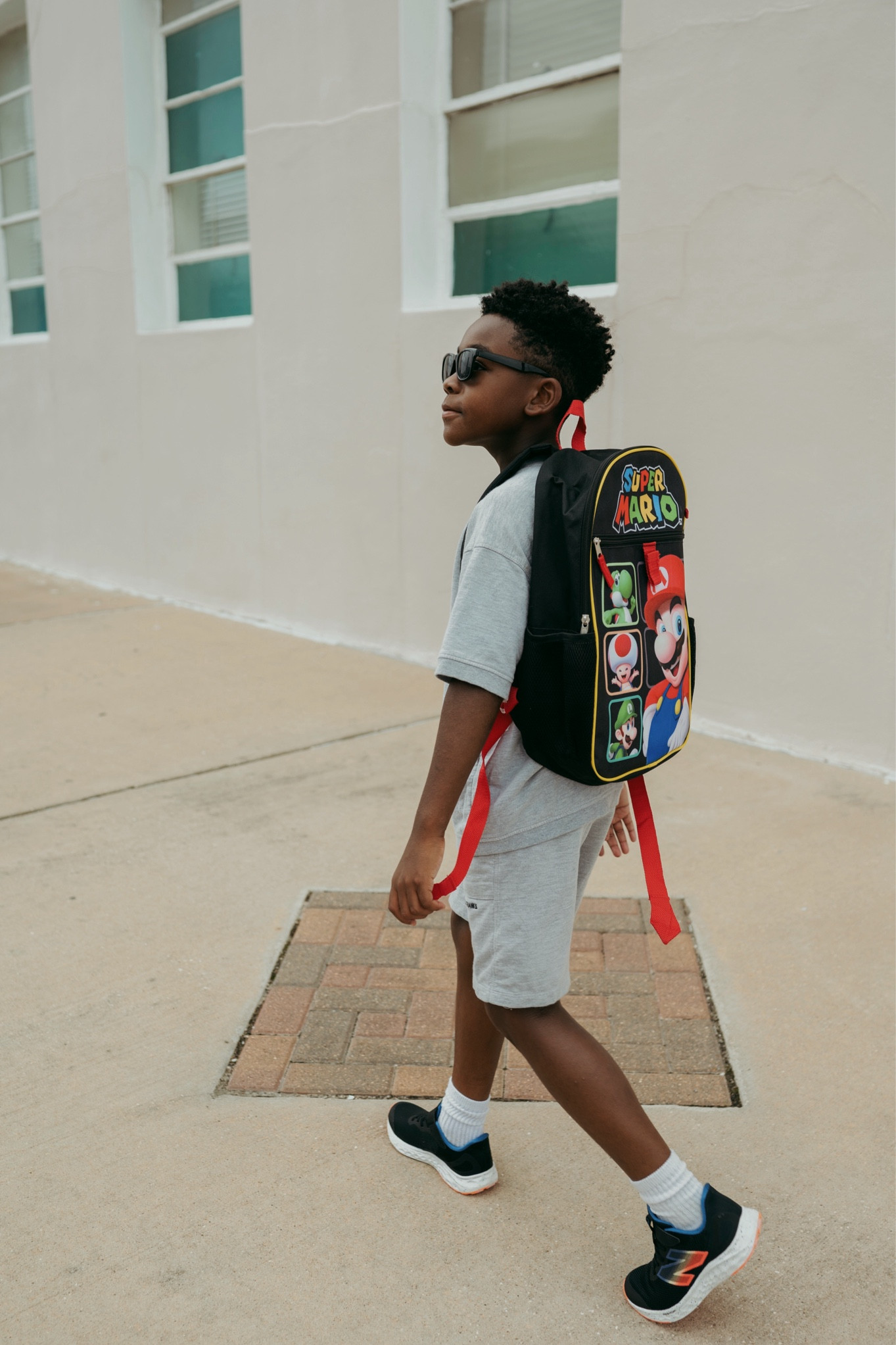 Back to school outfit: grey shorts and tshirt set, new balance sneakers, Mario backpack (20% off)

#LTKStyleTip #LTKFamily #LTKKids