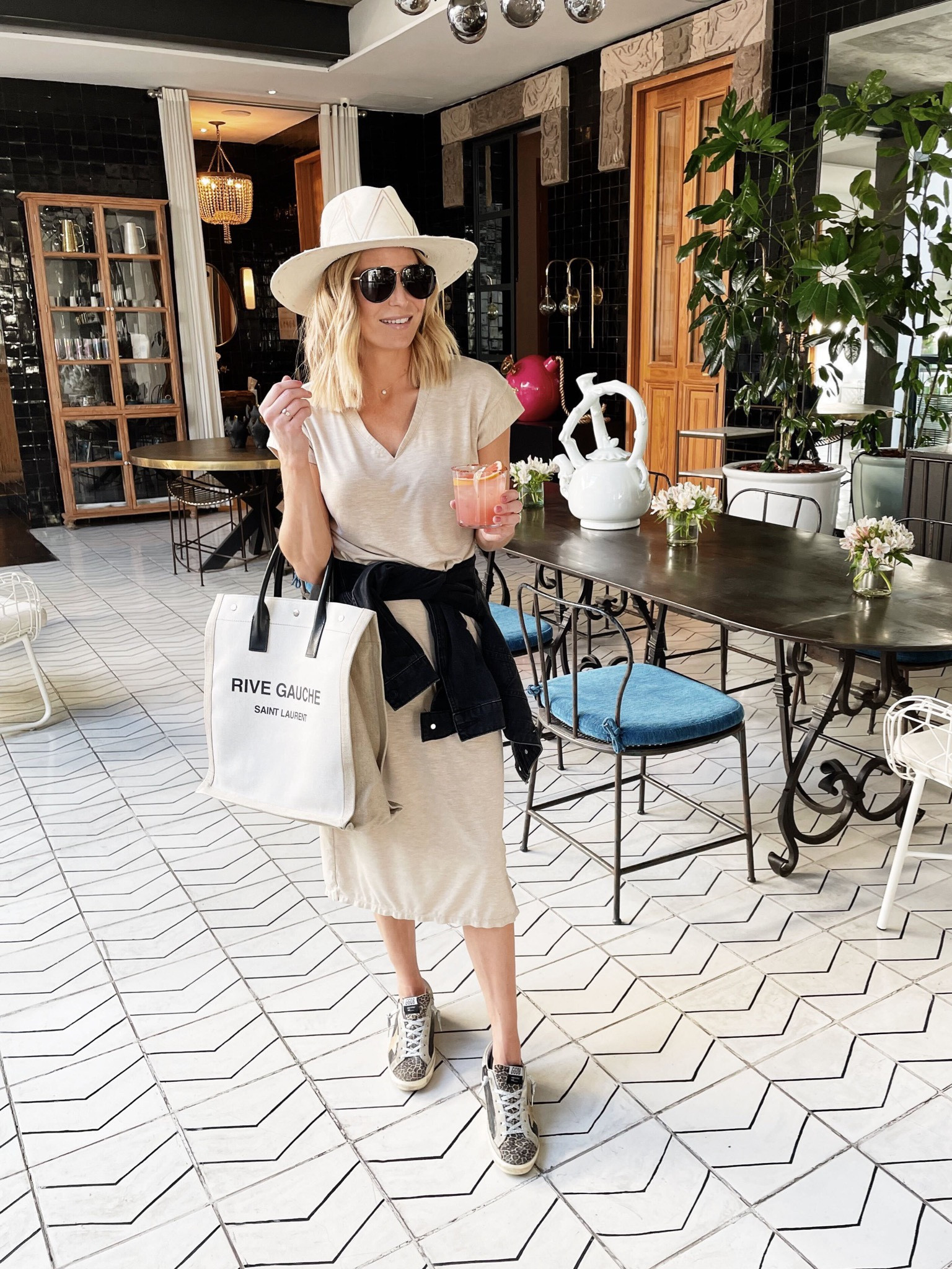 Easy travel look✈️✈️ similar t-shirt dresses. Denim jacket, similar sneakers, Saint Laurent tote, similar hat and sunglasses. 

#LTKFind #LTKstyletip #LTKtravel