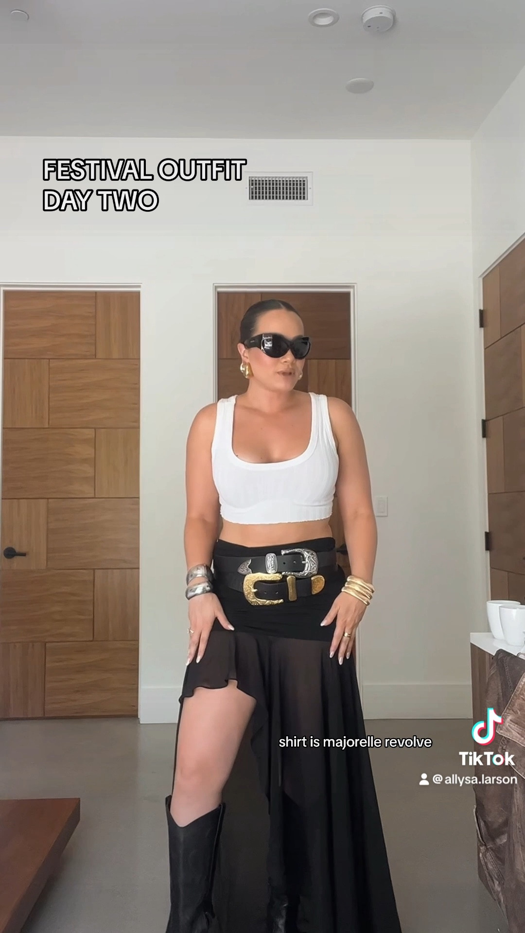 Black maxi skirt outfit for Coachella styled with chunky belts and gold and silver jewelry 

#LTKSeasonal #LTKootd #LTKFestival