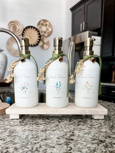 Love these spring bottles for the kitchen counter can’t link exact but found some similar items  #kitchen #soapbottle #soapdispenser #stonetray 

#LTKhome #LTKGiftGuide #LTKstyletip