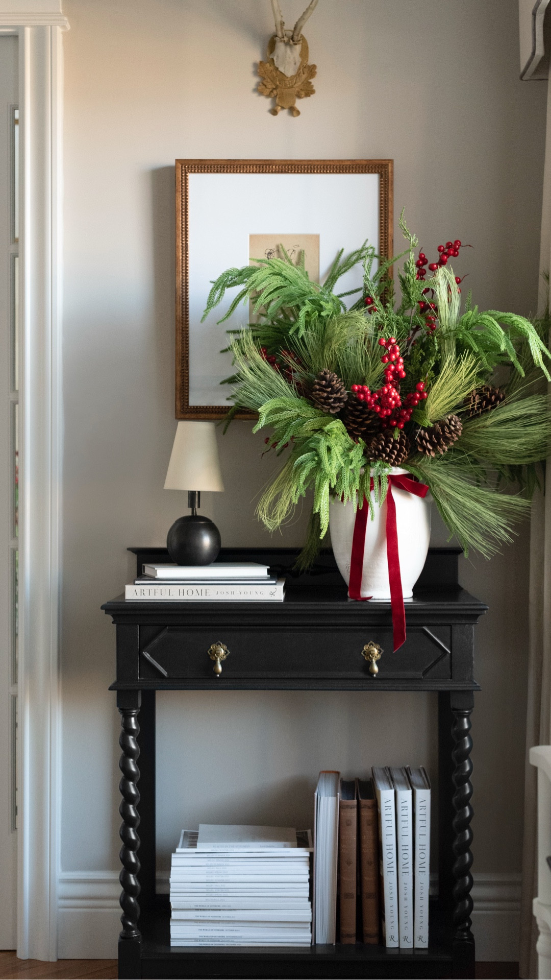 An easy holiday arrangement I pulled together using leftover greenery for the corner of my office… everything is linked! This would also make a great table centerpiece. 

#LTKHome #LTKHoliday