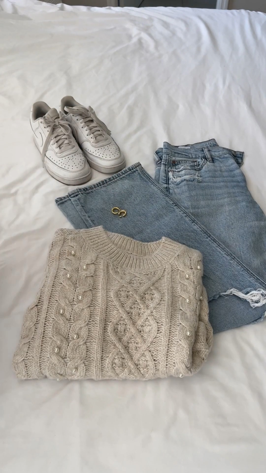 Cozy meets casual 🤍 the perfect winter uniform ❄️ soft knit, lived in denim, and crisp white sneakers 👟 Effortless, comfy, and still totally put together ✨ #WinterCasualStyle #LTKUnder100 #CozyChic #NeutralOOTD #EverydayStyle #LTKWinterFashion #EffortlessOutfits

#LTKGiftGuide #LTKHoliday #LTKSeasonal