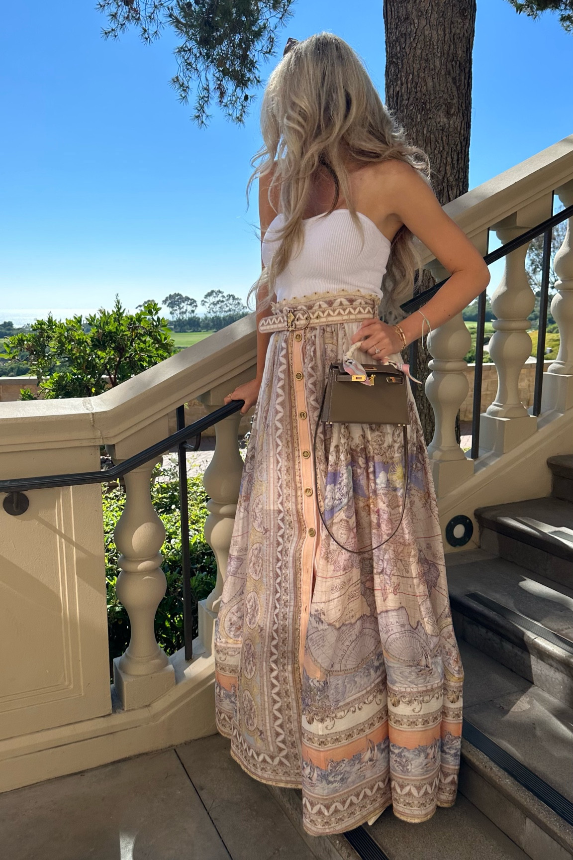 The dreamiest maxi skirt in the most beautiful pastel colors. It’s a work of art and the ultimate chic skirt for a lunch, shopping day and even a day at the beach club. Would also be a perfect outfit for a wedding guest - always tricky to know what to wear during an entire weekend. You need to be quite tall to fit in the skirt - I’m wearing a size 1 and I still need to wear heels with it even though I’m 172 cm/5’7 👗 pair it with a basic neutral top and a cute bag and you will look amazing! The skirt is currently on sale so hurry!💗 #maxiskirt #pastelcolor #elegant #chicskirt #resortwear #summeroutfit #weddingguest

#LTKSeasonal #LTKsalealert #LTKwedding