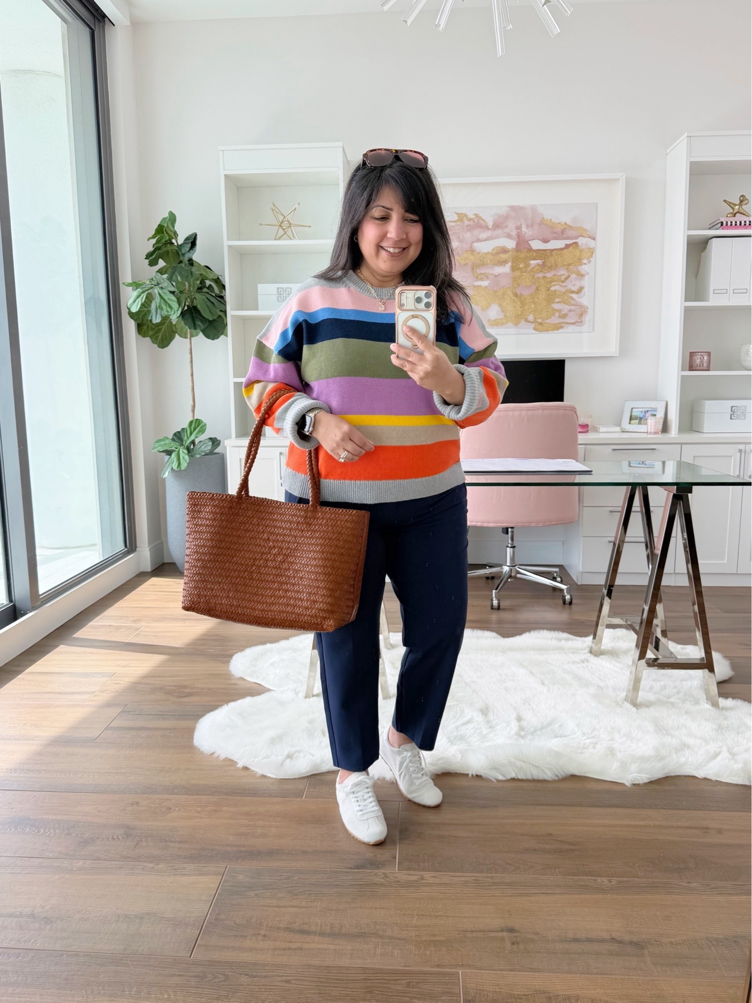 Aren’t these colors so bright, fun and happy?! Love this color combo on this cotton crewneck sweater. Perfect for spring  outfits and cool summer nights. Paired it with these amazing pants from Athleta and a cute pair of low profile sneakers. Added this woven tote bag which is great for everyday wear and makes a really nice work bag too that can hold your laptop and any other work related items. 

Boden striped sweater size large. Athleta white tee size XL. Athleta navy pants size 12 Petite. Dolce Vita sneakers. If in between sizes, size up. Madewell woven tote bag. 

Spring outfits 2026, summer outfits, work outfits, business casual workwear, weekend outfit, work from home outfit, casual everyday outfit, travel outfit

#LTKMidsize #LTKPetite #LTKxMadewell