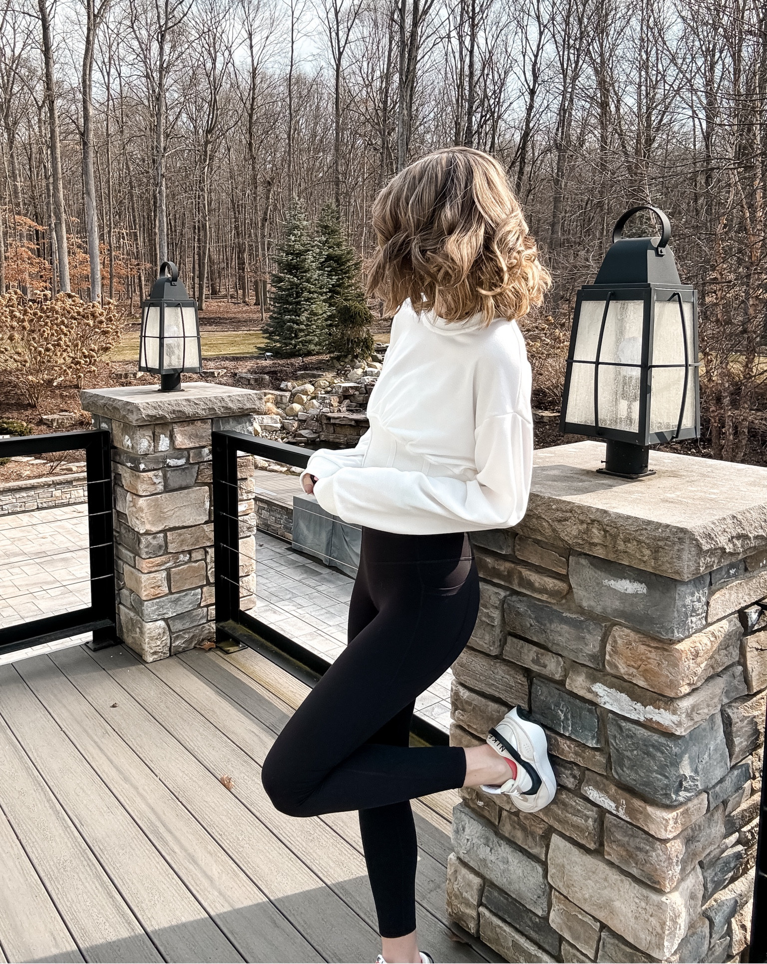Halara white corset sweatshirt and black pocket leggings outfit ideas for mom life with Nike sneakers 