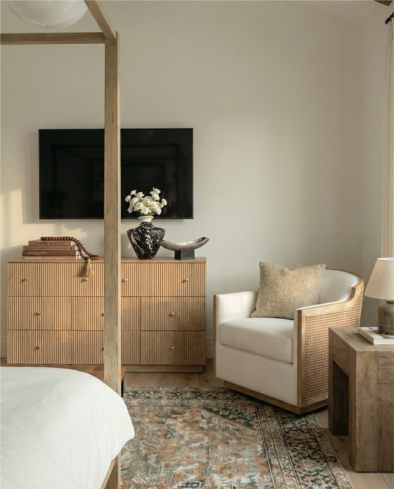 Wood canopy bed 
Brown leather upholstered bench
Brown knitted blanket
Brown throw pillows
Brown wood 3 drawer nightstands
Wall art
Glove wall lights
White tree planter
Black vase
Black table lamp
White decor bowl
Decor books
Wood dresser
Brown traditional rug 
Wood decor beads
Wood upholstered swivel chair
Wood end table
Green runner rug 
Faux olive tree 

#LTKHome #LTKSaleAlert