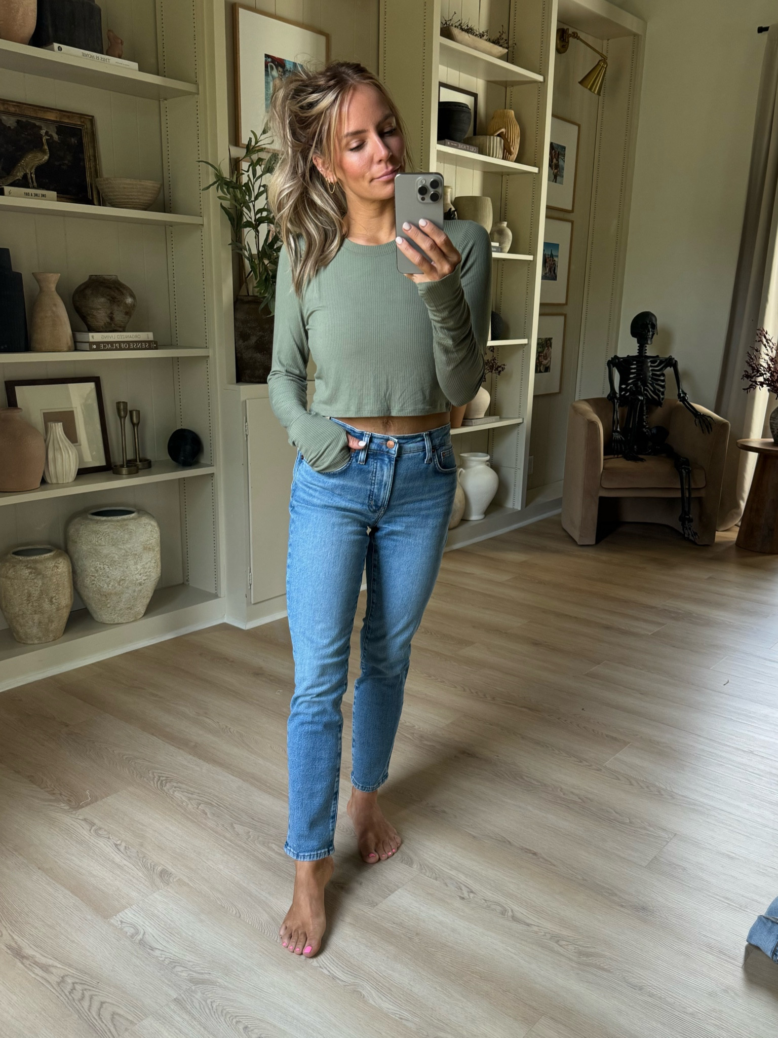 I’m wearing a 25 regular in the jeans and a medium in the top! 