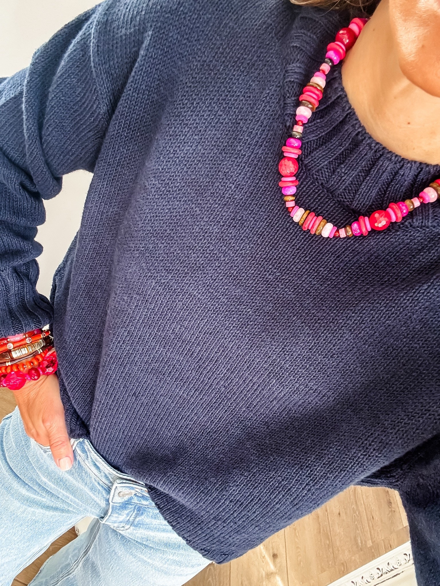 Small navy blue sweater. Jewelry code HOUSEOFLEO20 . Beaded necklace. Beaded bracelets.

#LTKOver40