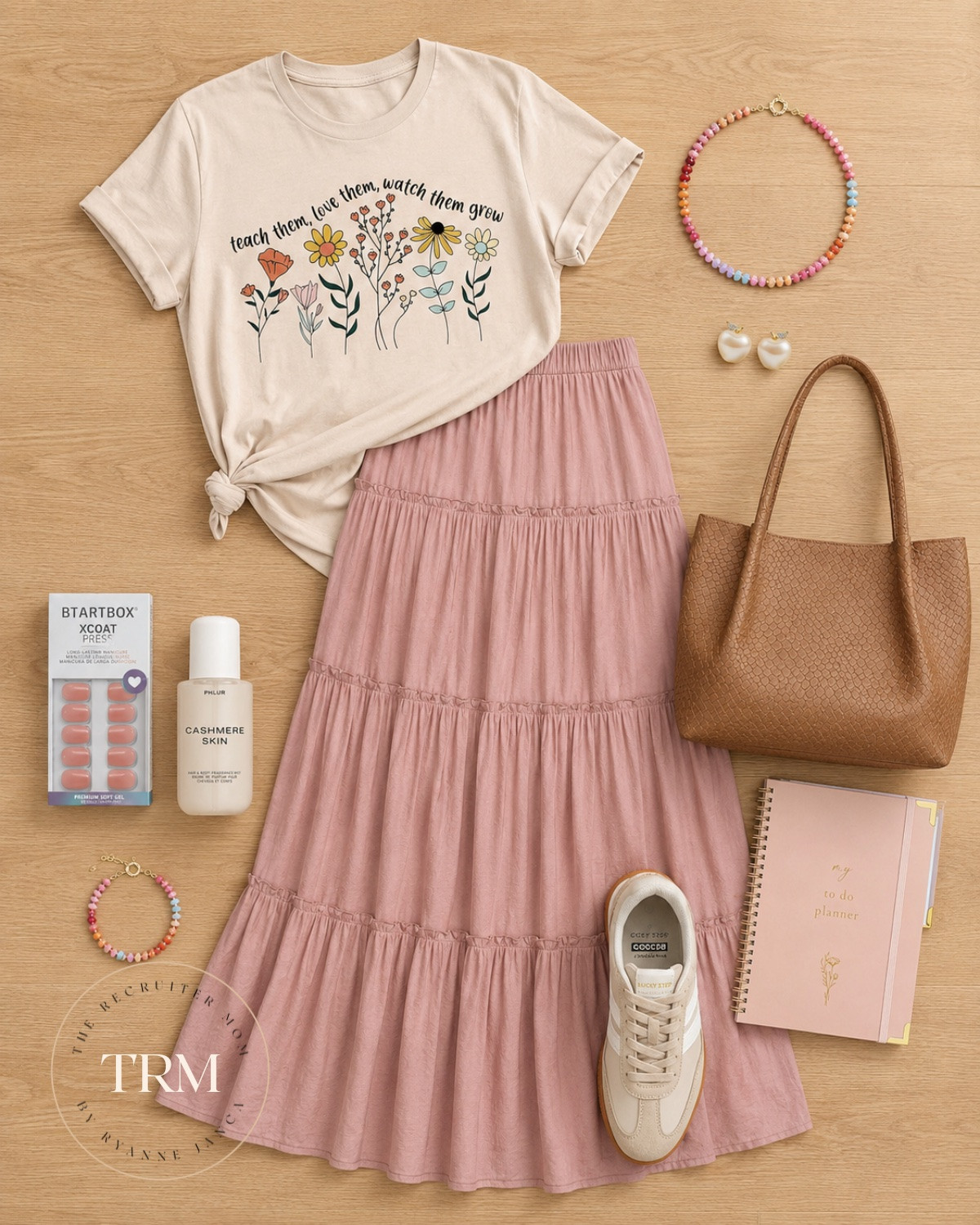 Teach them, love them, watch them grow 🌸 This graphic tee + pink midi skirt combo is everything I want to wear to carpool and beyond. The knotted tee trick is a game changer for proportions and those sneakers are perfect for anyone all their feet all day. All linked below! ✨

#LTKgrwm #LTKSeasonal #LTKWorkwear