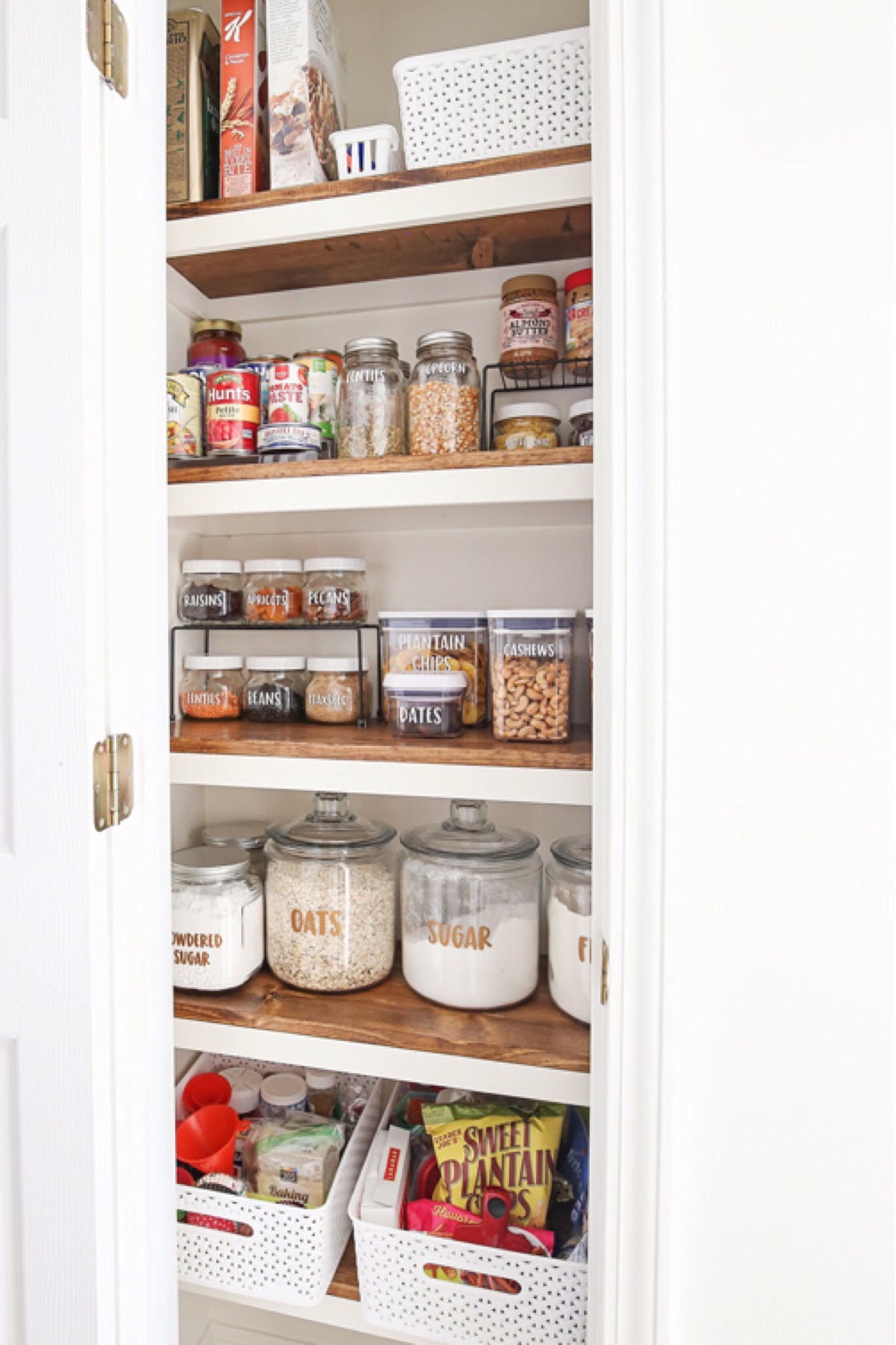 So nice to have an organized pantry!

Large glass jars 1 gallon amazon
Mason jar wide mouth lids plastic white amazon
Kitchen pantry shelves metal black amazon 
Oxo good grips 3 pack 1.1 qt amazon 
Oxo good grips 1.7 qt amazon 
Mason jars 16 oz wide mouth amazon
Mason jars 32 oz regular mouth amazon 
Mason jars 16 oz regular mouth target 
White pantry storage basket target 
Oxo mini snack container amazon 

#LTKfindsunder50 #LTKhome #LTKsalealert