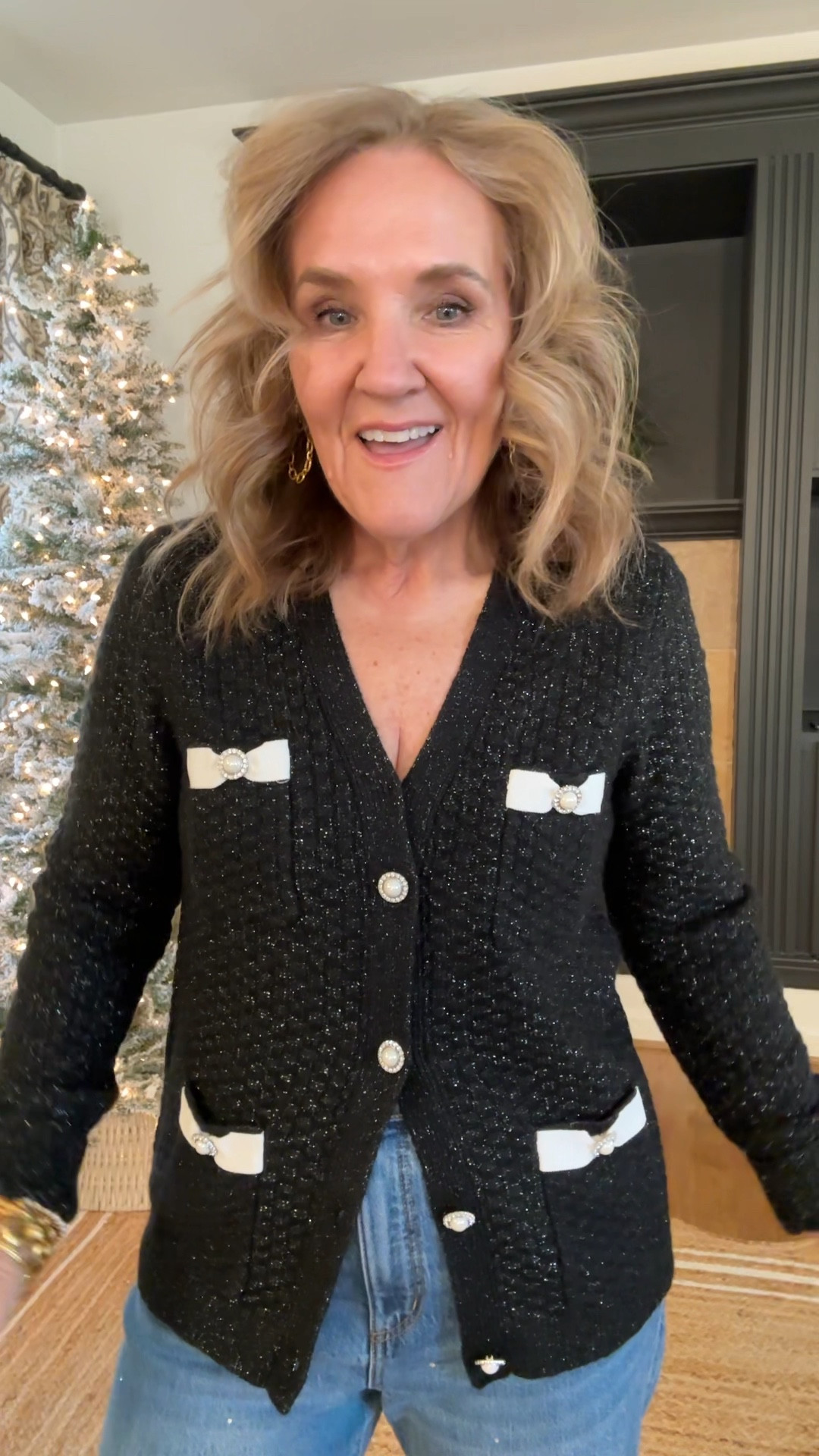 60% off loft cyber Monday sale! 
Size medium in sweater 
Size 29 in jeans they are a relaxed fit

Size up a full size in the boots code CYBER for 30% off 

Black sweater with bows holiday style winter sweater holiday outfits Christmas party outfits embellished jeans 