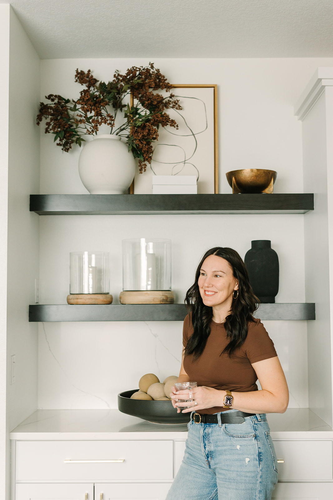 My kitchen shelf styling 🤍 Simple, neutral pieces that make the space feel calm and intentional, with art, a vase and stems, statement candles, and small accent pieces that tie it all together. 

 

#LTKHome