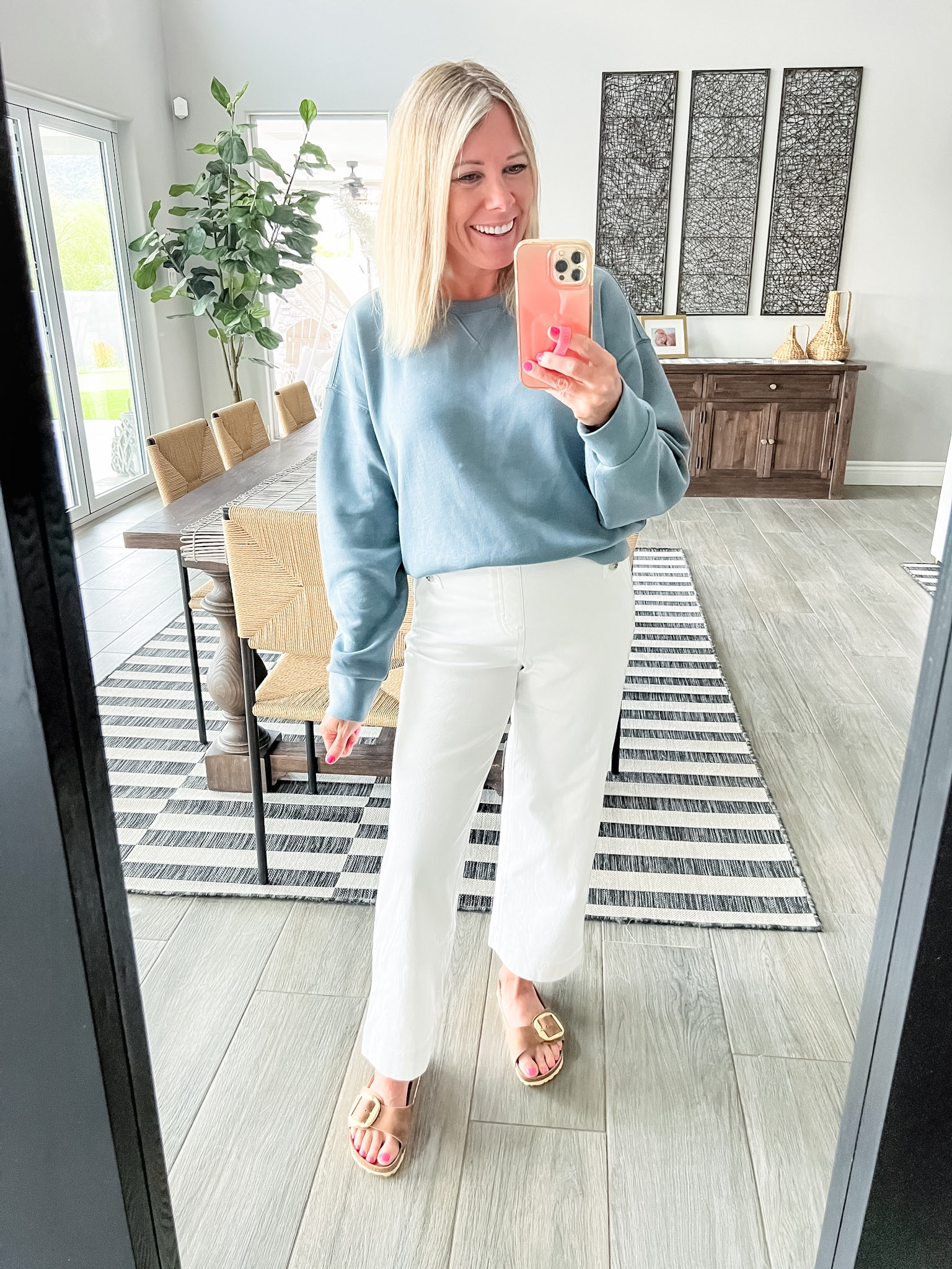 Love these white wide leg pants with this Spanx air essentials sweatshirt and brown Birkenstocks. Size small and everything pants run. True to size. Spring outfit ideas use code Jennyxspanx for 10% off and free shipping.

#LTKSeasonal #LTKstyletip #LTKshoecrush
