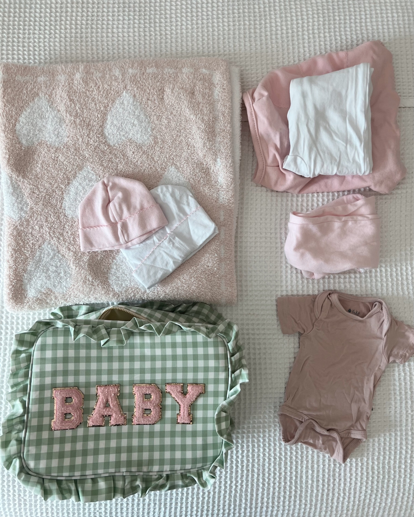 What I packed for the hospital for baby girl. I brought a few different sizes to make sure I have something that will fit. I got 2 going home outfits monogrammed too with hats! And I love this sweet little blanket!