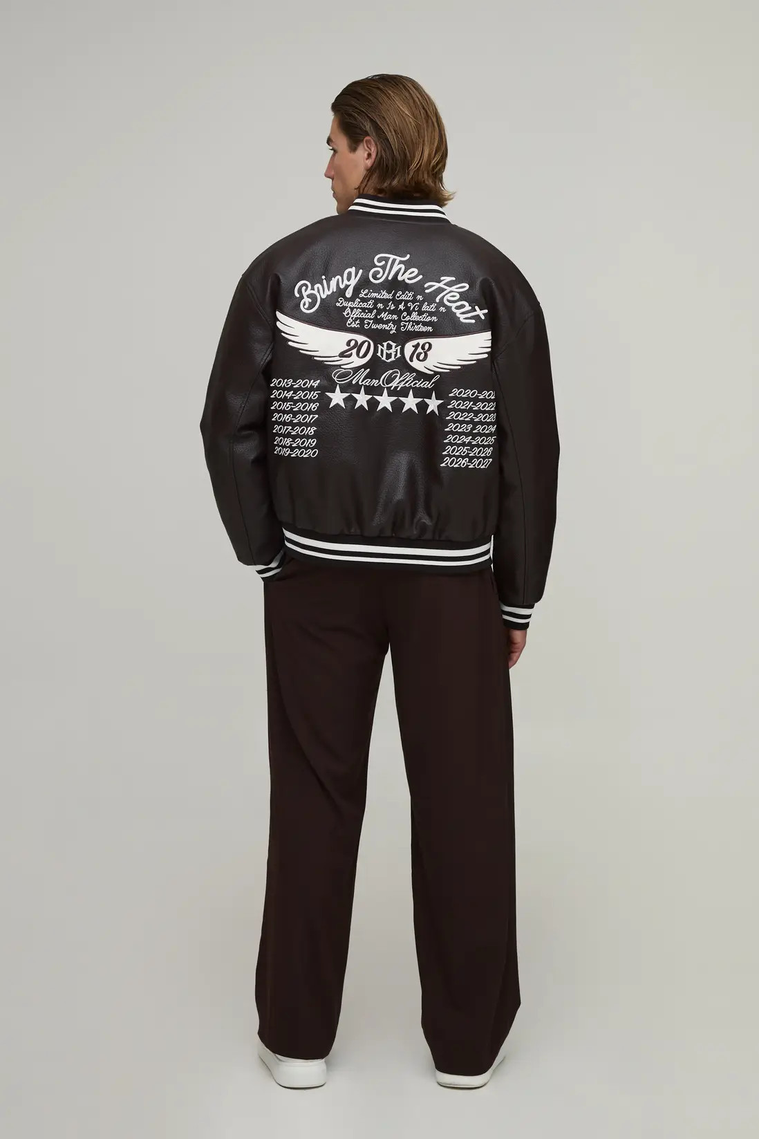 Brown boohooMAN Baggy Fit Pleat Front Belted Tailored Look Trousers | Boohoo | Boohoo.com (UK & IE)