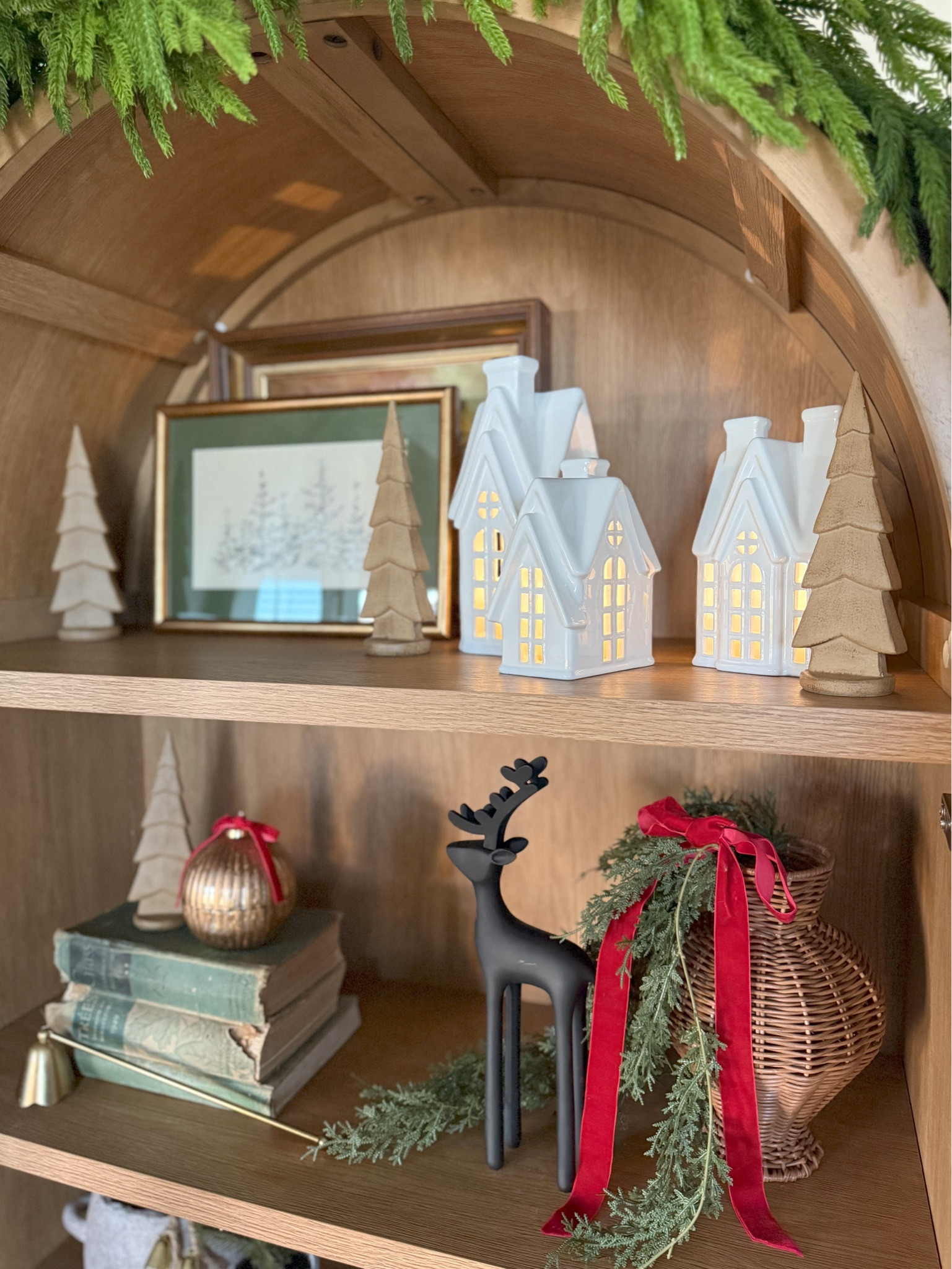 Better Homes & Gardens arch cabinet Christmas styling! Loving this combination of true old vintage and new! Stay tuned for more! 

#LTKHoliday #LTKHome #LTKSeasonal