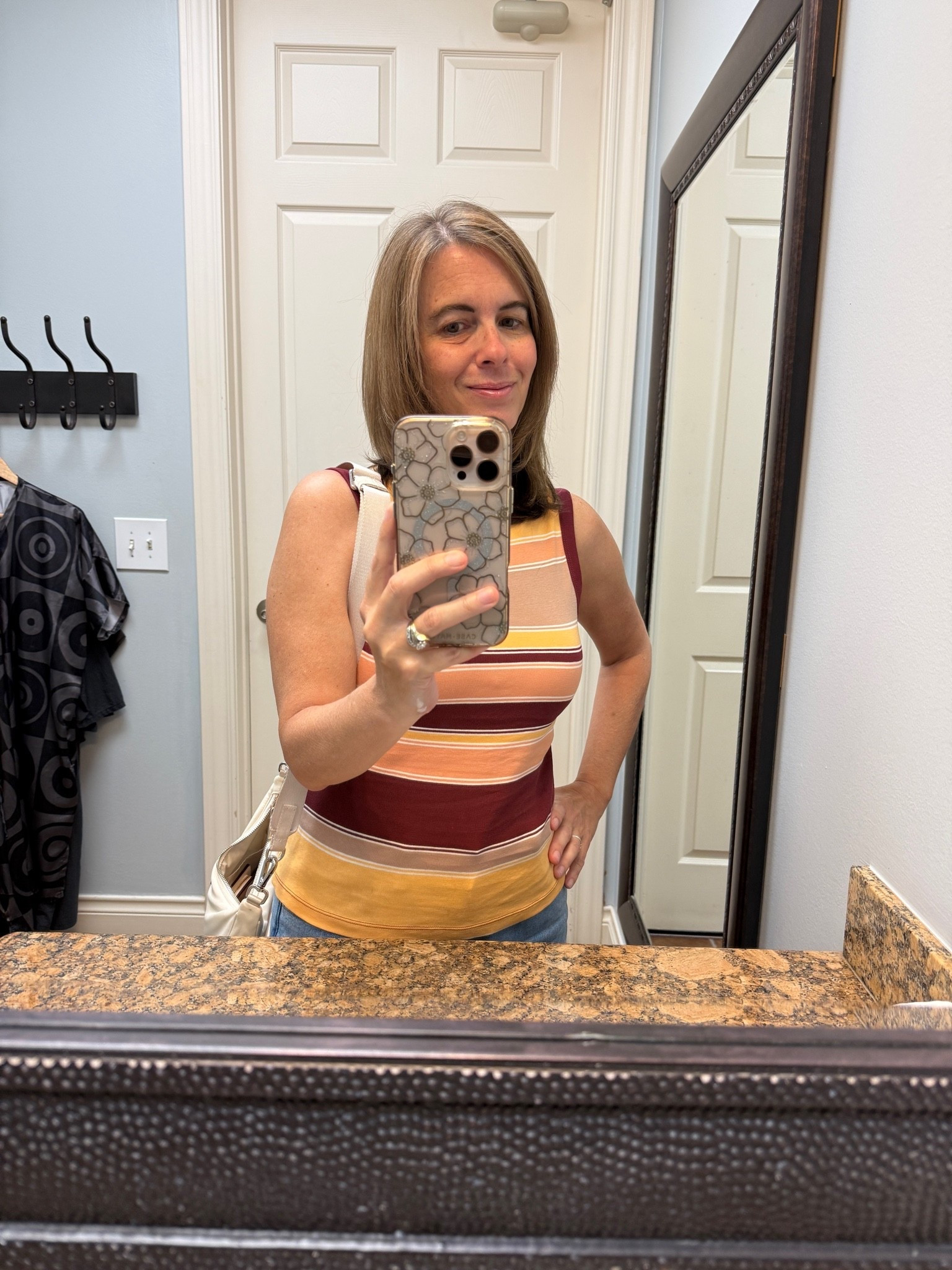 Today was hair day. 🤍 I’m wearing a casual sleeveless top and jeans with comfortable sandals.

#LTKdayinmylife #LTKootd #LTKOver40
