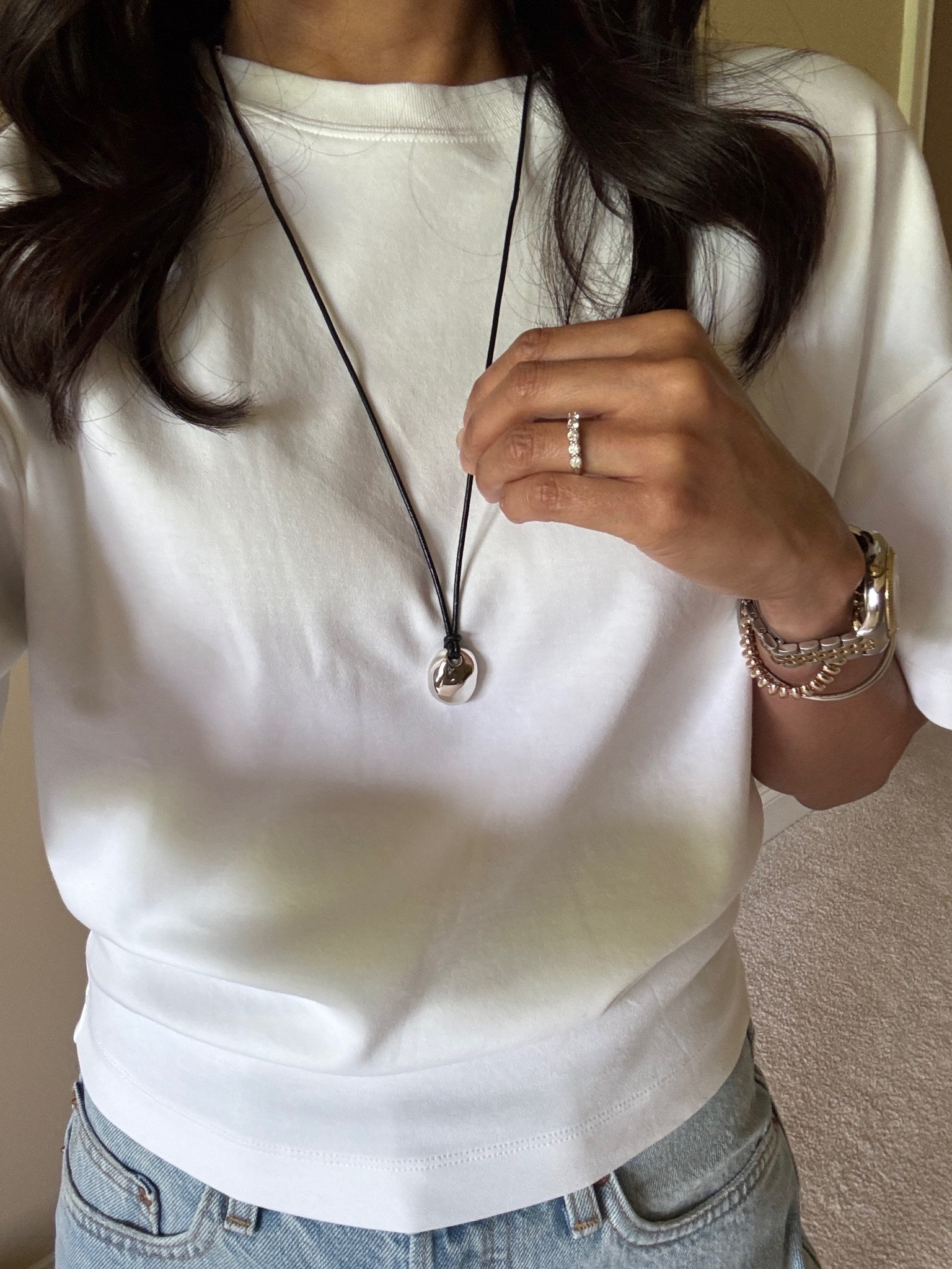Pendant necklace. I have been looking for a necklace of this design and I like this size. Simple statement for basic outfits. 
Adjustable length. 
Comes in silver and in gold. 
Elevated t-shirt true to size. 
Denim shorts size up.

#LTKOver40 #LTKootd