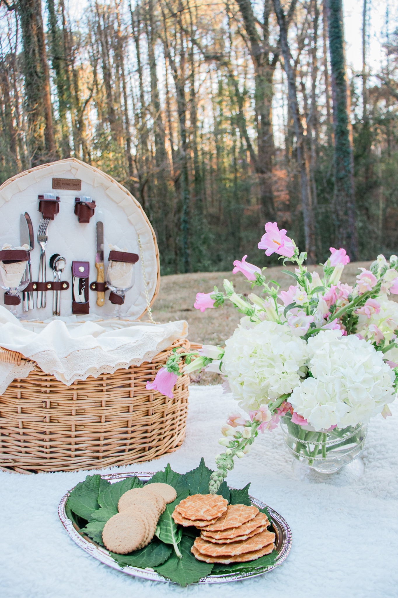 A Galentine’s Day Picnic set for two Queens 👑 I adore Kathy Kuo for everything home - a one stop shop for gifts & have-it-forever heirlooms like this Juliska hurricane (used as a vase) and heart-shaped picnic basket perfect for any picnic! #ad #kathykuohome

#LTKhome #LTKSeasonal #LTKGiftGuide