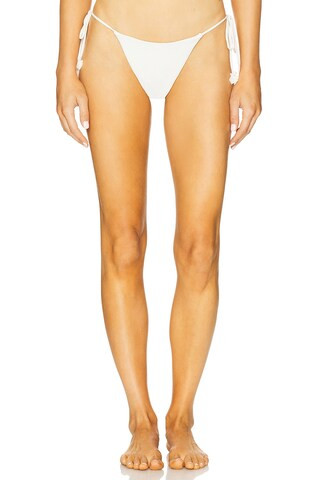 DEVON WINDSOR Lio Bikini Bottom in Off White Texture from Revolve.com | Revolve Clothing (Global)
