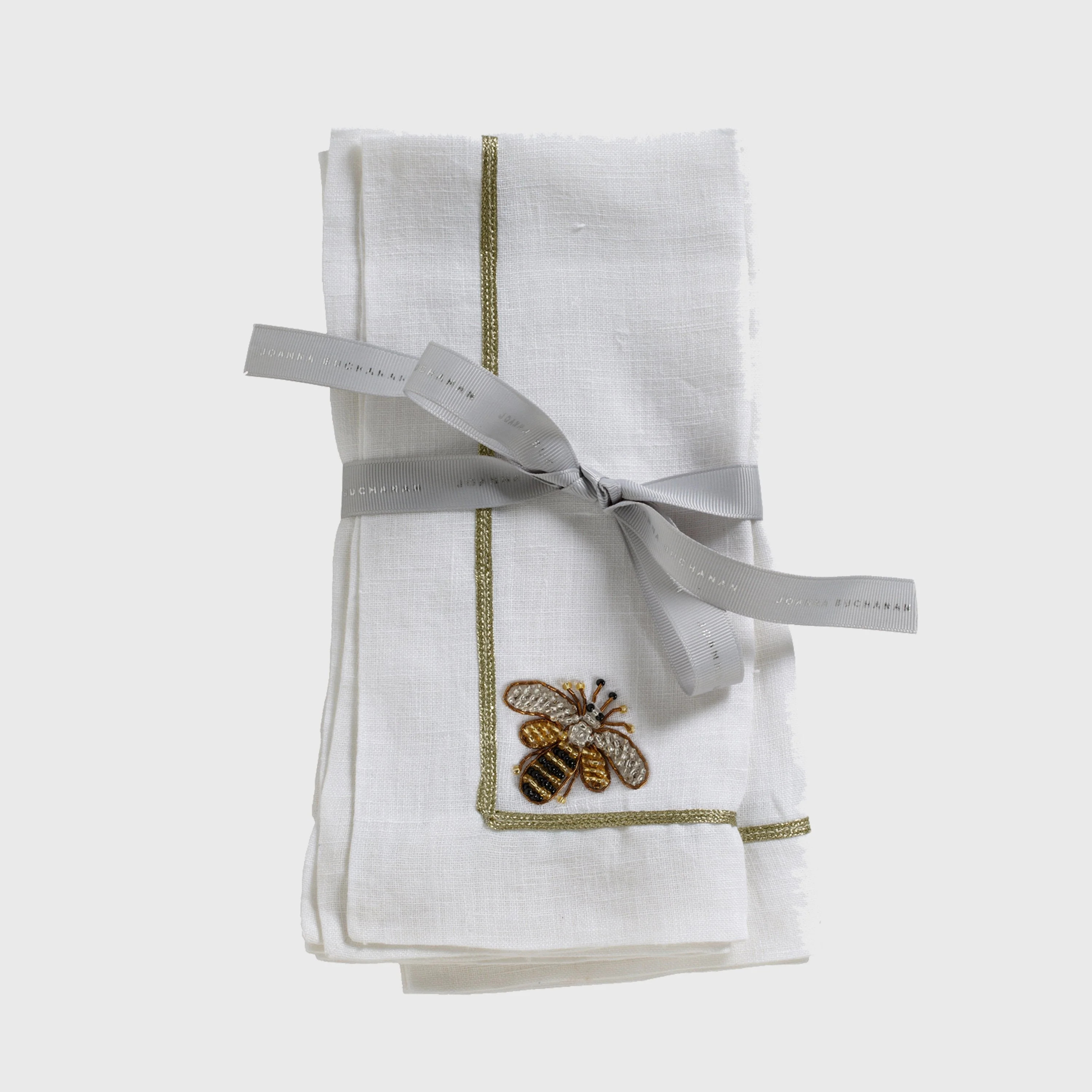 Stripey bee linen dinner napkins, white, set of two | Joanna Buchanan