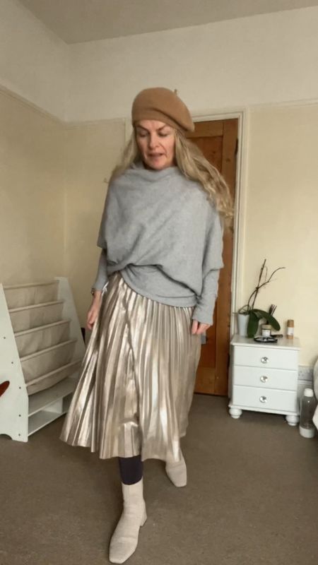 Styling a gold pleated skirt for daytime #goldpleatedskirt #goldmaxiskirt #asymetricsweater #asymetric 

#LTKSeasonal #LTKeurope #LTKstyletip