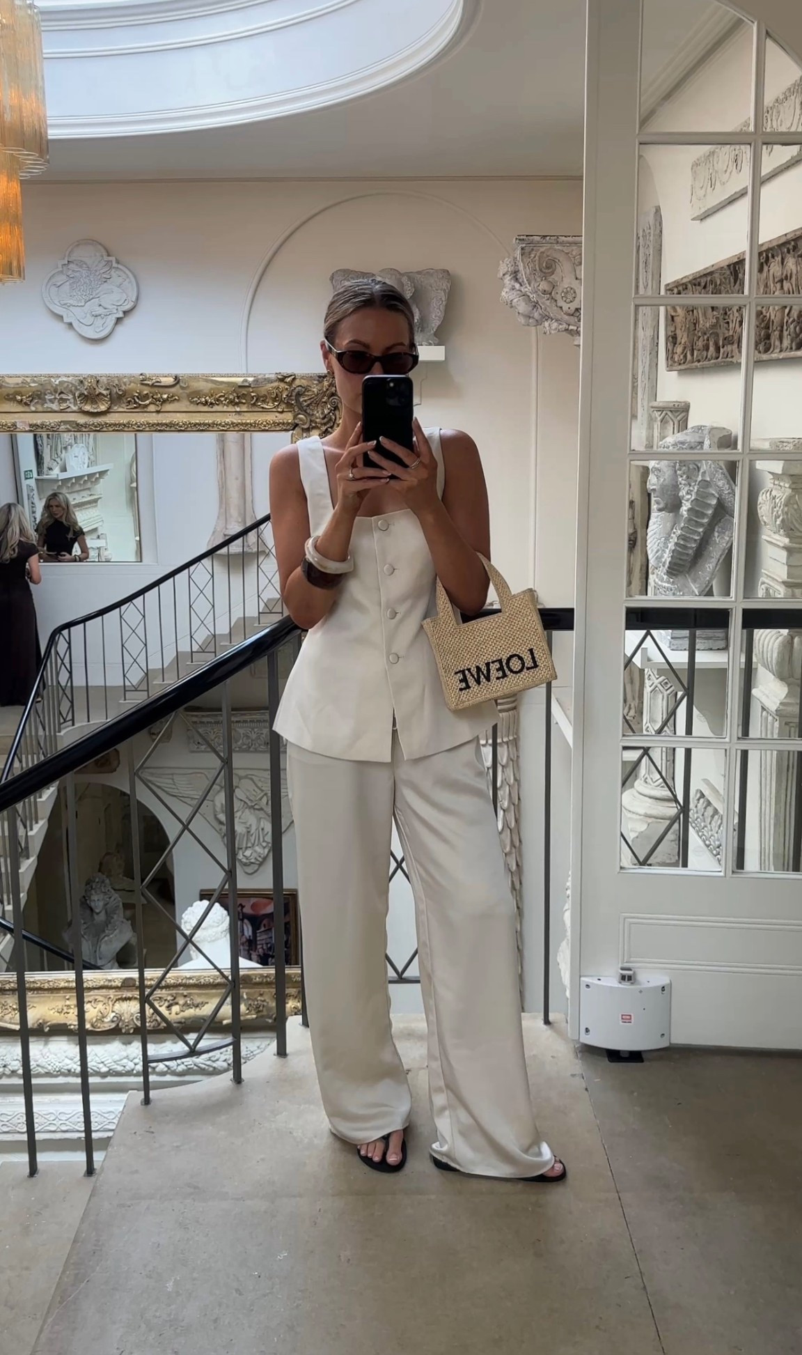 Pretty lavish, satin trousers, satin waistcoat, cream waistcoat set, straight leg trousers, chic outfit, chic style, neutral outfit, Loewe bag, Loewe Ibiza bag, 

#LTKstyletip #LTKeurope #LTKsummer
