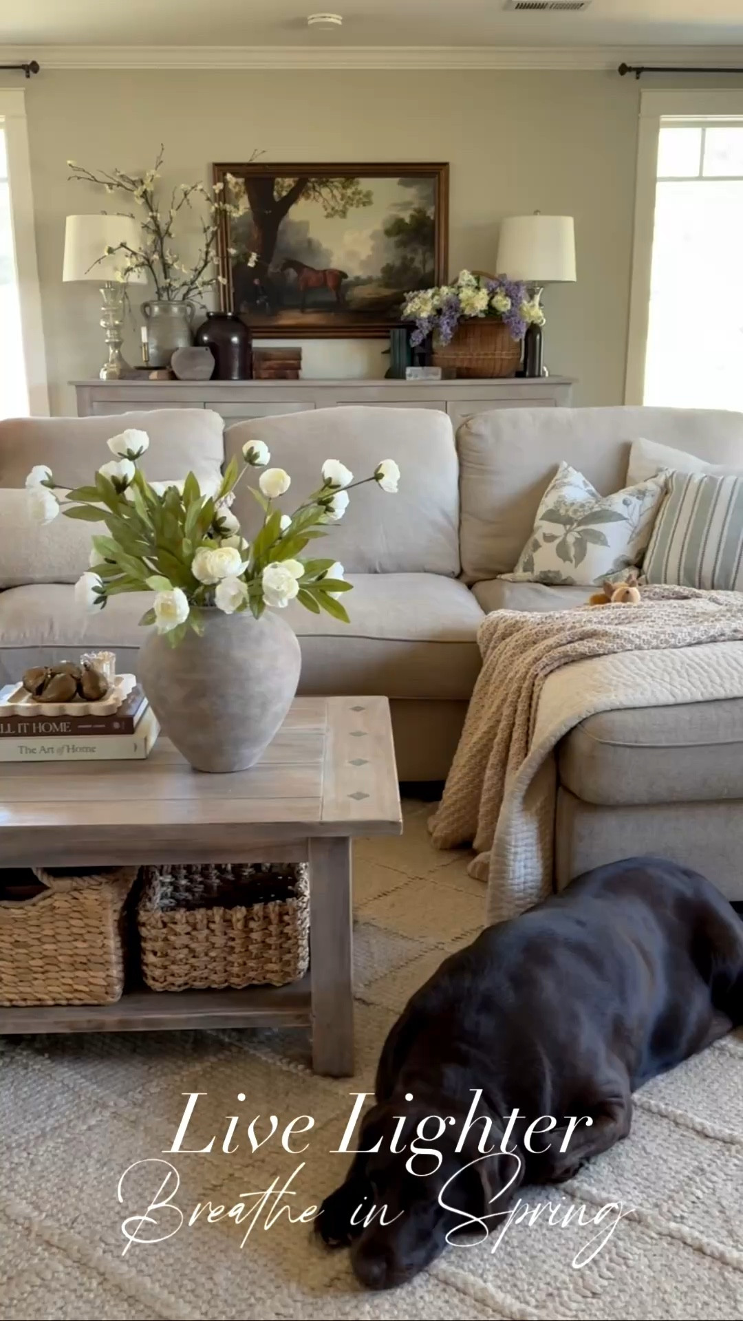 🌿 The living room just took a deep breath — and so did I.
Sometimes a refresh isn't about starting over. Just swapping the right things. ✨
Out with the heavy cozy — in with crisp linen pillow covers in beautiful spring greens and mixed prints that give that effortlessly designer layered look. Still cozy. Just lighter.
The coffee table got a little love too — fresh florals, pretty spring accents, and a lemon scented candle with the prettiest floral top that makes the whole room smell like the season. 🕯️🌸
Same home. New season. Completely transformed. 💛

#LTKHome #LTKSeasonal #LTKSpringSale