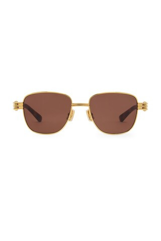 Bottega Veneta Bolt Sunglasses in Gold &brown from Revolve.com | Revolve Clothing (Global)