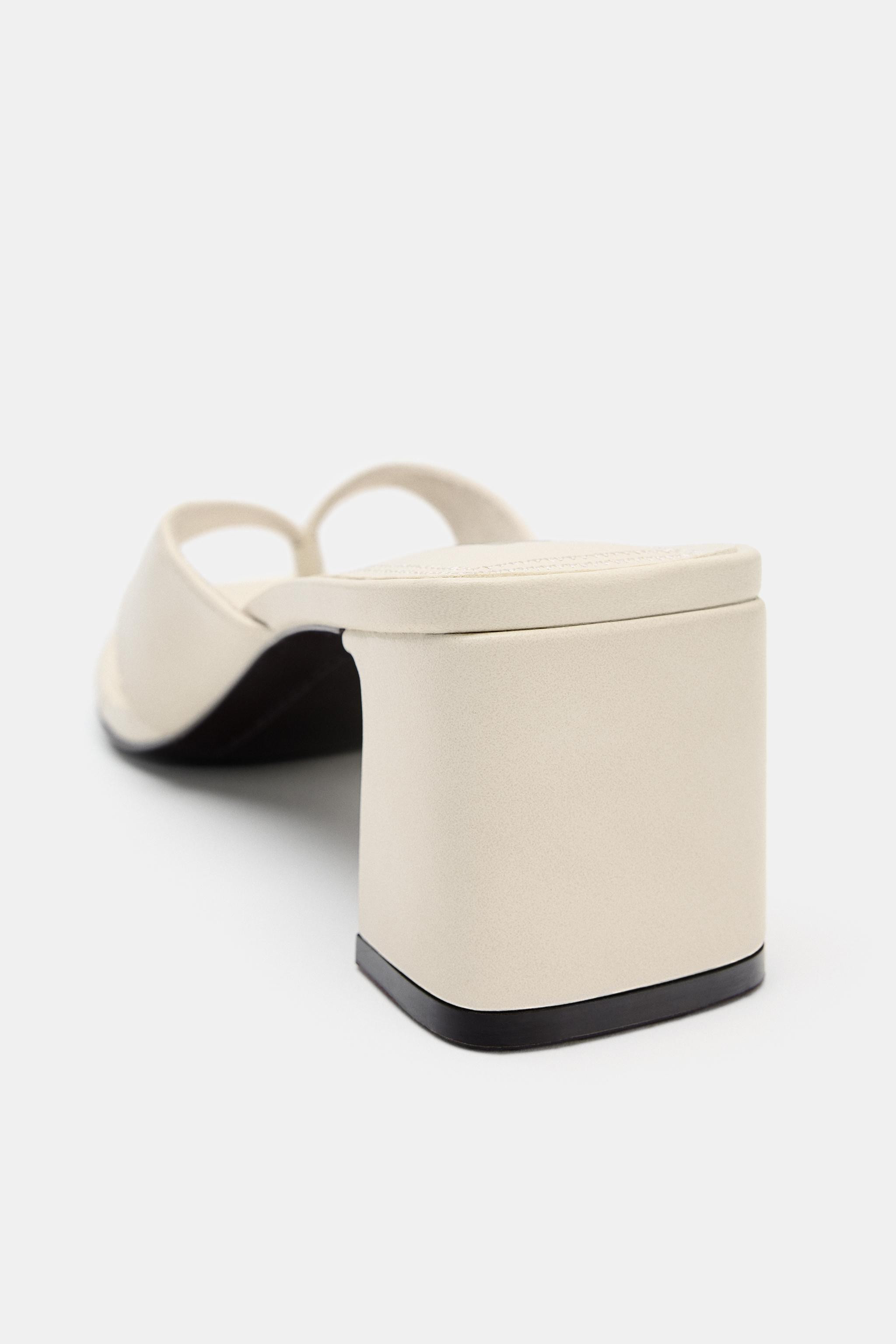 Heeled sandals. Mule style. Toe post strap. Wide mid-height heel. Squared toe.Heel height: 1.4 in... | Zara US