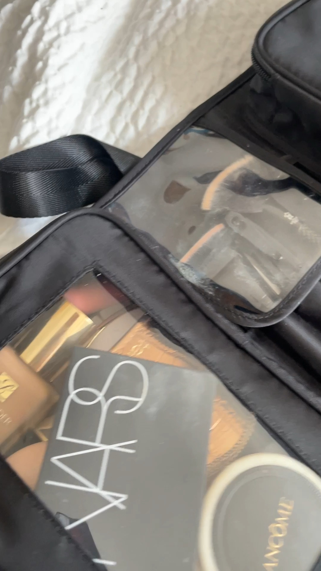 $19 today 
Amazon Travel Makeup Bag for Women for Cosmetics, Brushes, and Toiletries, Compact and Portable Makeup Organizer, Large Capacity Storage Cosmetic bag for Business, Vacation, or Weekend Traveling

This black, also comes in black & ivory and ivory. 

#LTKBeauty #LTKTravel #LTKSaleAlert