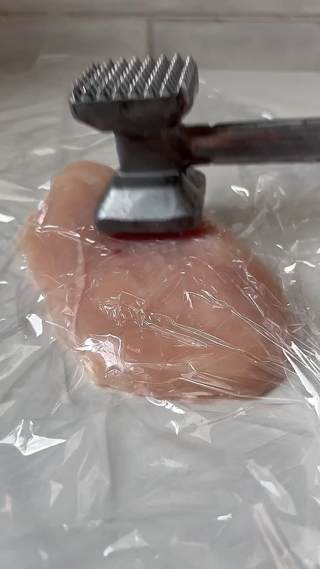 Chicken Cordon Bleu WITHOUT toothpicks! 🍗✨ My trick: wrap in plastic wrap, twist ends like a tootsie roll, refrigerate 30 minutes - stays rolled perfectly! Ham, Swiss cheese, crushed cornflakes coating. Easier than you think! Shop my meat mallet + food processor below! Recipe on my blog! #chickenco rdonbleu #notoothpicks #trick #easydinner 

#LTKfoodie