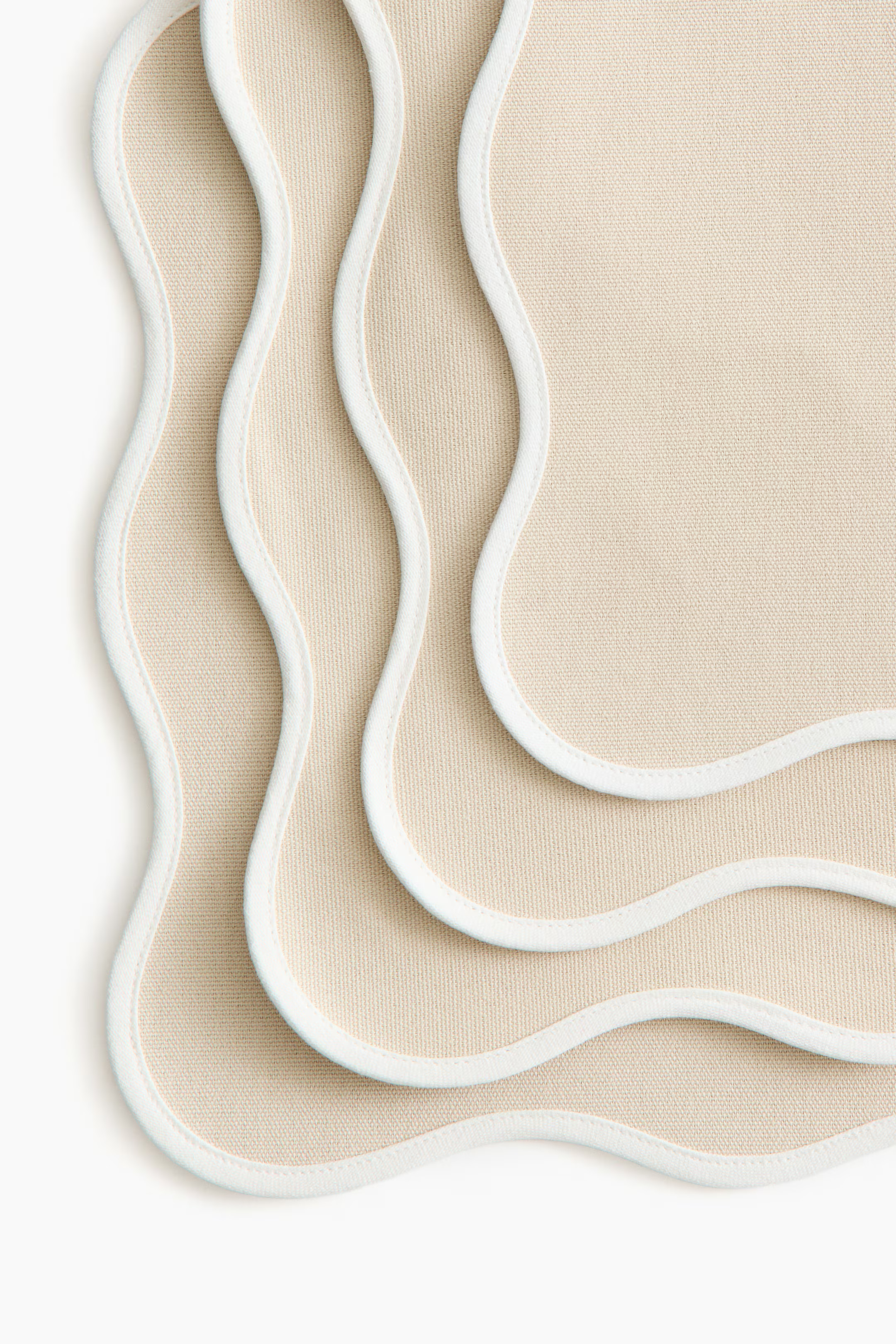 4-Pack Water-Repellent Placemats | H&M (US + CA)