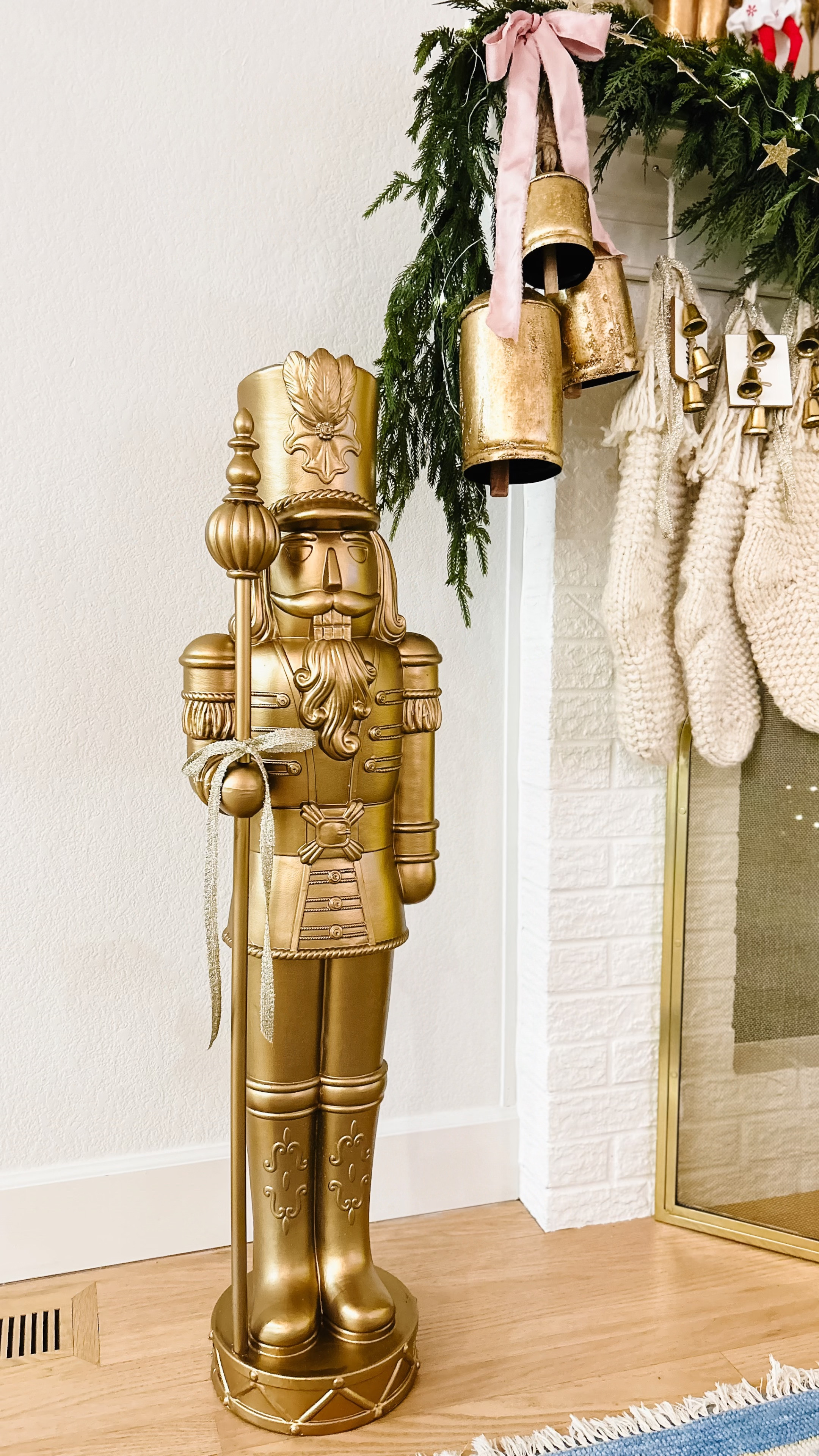 This nutcracker is indoor or outdoor and lights up. I spray painted him gold to match my decor but he was cute before I did. A great price! 

#LTKhome #LTKHoliday #LTKSeasonal