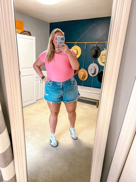 My Abercrombie order came in while I was on vacation and OMG - these t-shirt bodysuits are amazing! A soft and sculpting material that fits so good. I styled them here with these curve love jean shorts and my favorite sneakers! The hot pink is 🔥🔥🔥

Shorts are size 35 (size 20). I like a looser fit for shorts so normally size up one and these fit perfectly. I can wear their size 24 also - just tighter. 

Bodysuit is size XXL - very stretchy! Fits TTS

Sneakers fit TTs also. 

Plus size outfit 
Plus size shorts 
Plus size ootd
Bodysuit
How to style 
Pink bodysuit 
Hot pink top 
Size XXL 
Size 2X 
Size 18
Size 20
Adidas samba 
Samba 

#LTKshoecrush #LTKover40 #LTKplussize