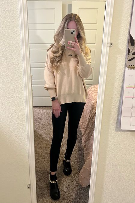 Casual edgy outfit. Faux leather leggings, Steve Madden boots, oversized sweater