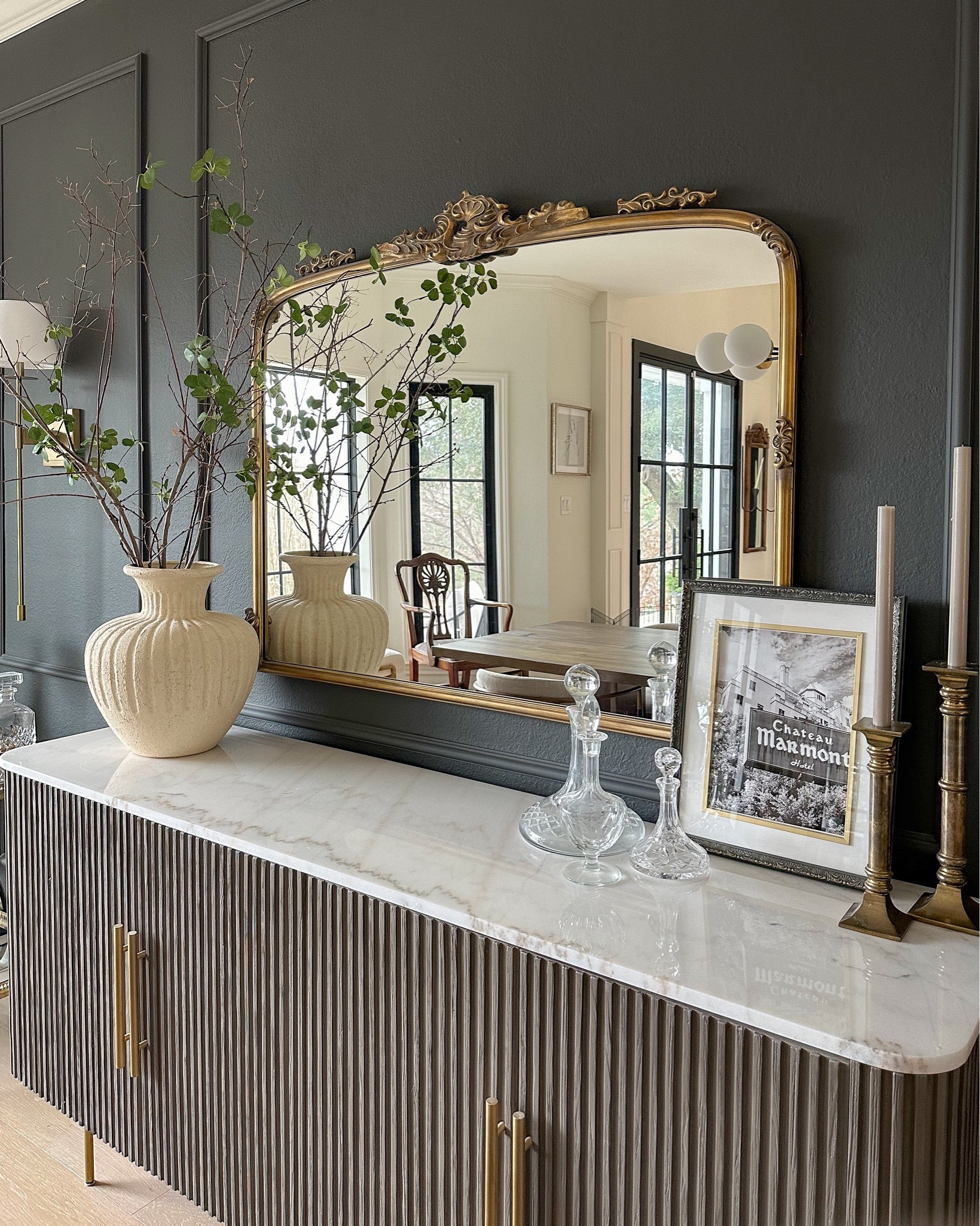 This beautiful gold antique inspired mirror and fluted sideboard are on sale this weekend! The quality is amazing and we’ll have these for years to come! Decor that isn’t linked is vintage!

#LTKHome #LTKStyleTip #LTKFindsUnder100