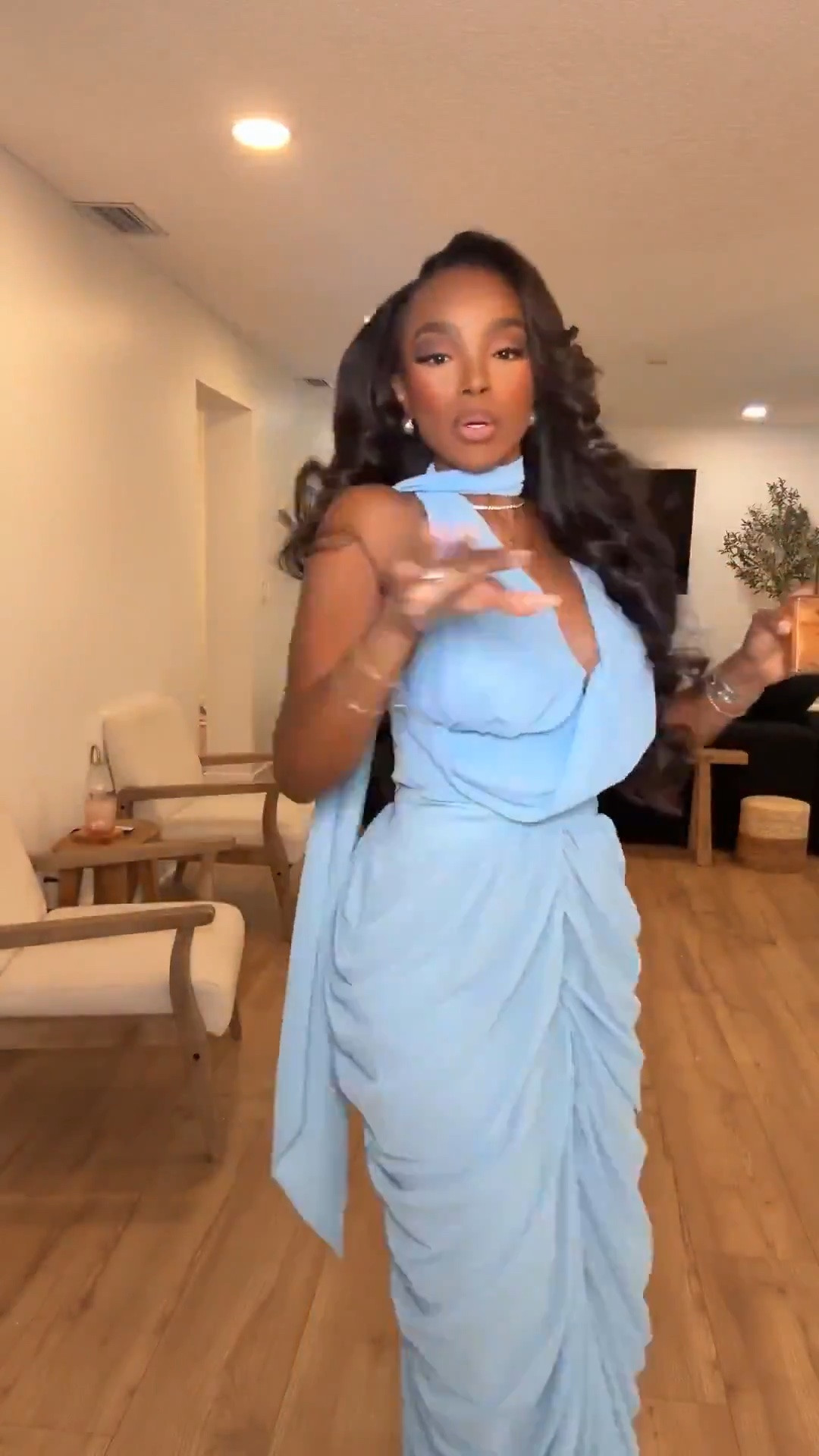Hi Babes!

This powder blue dress is pure elegance. The draped neckline, soft ruching, and flowing scarf detail create such a romantic, expensive-looking silhouette that feels straight off a designer runway. It's feminine, flattering, and one of those dresses that instantly makes you feel confident the moment you put it on.

If you're curvy, this style is beautiful because the draping enhances your shape while the ruching creates a smooth, sculpted fit through the waist and hips. The soft blue color is timeless, photographs beautifully, and works for so many special occasions, making it a piece you'll reach for again and again.

Where to wear this:
• Wedding guest events
• Engagement parties
• Bridal showers
• Formal dinners
• Cruise vacations
• Special celebrations

Everything is linked below.

xx Kira | IG: KirasFashionFinds

34D - 27 - 40 • Size Small or 4