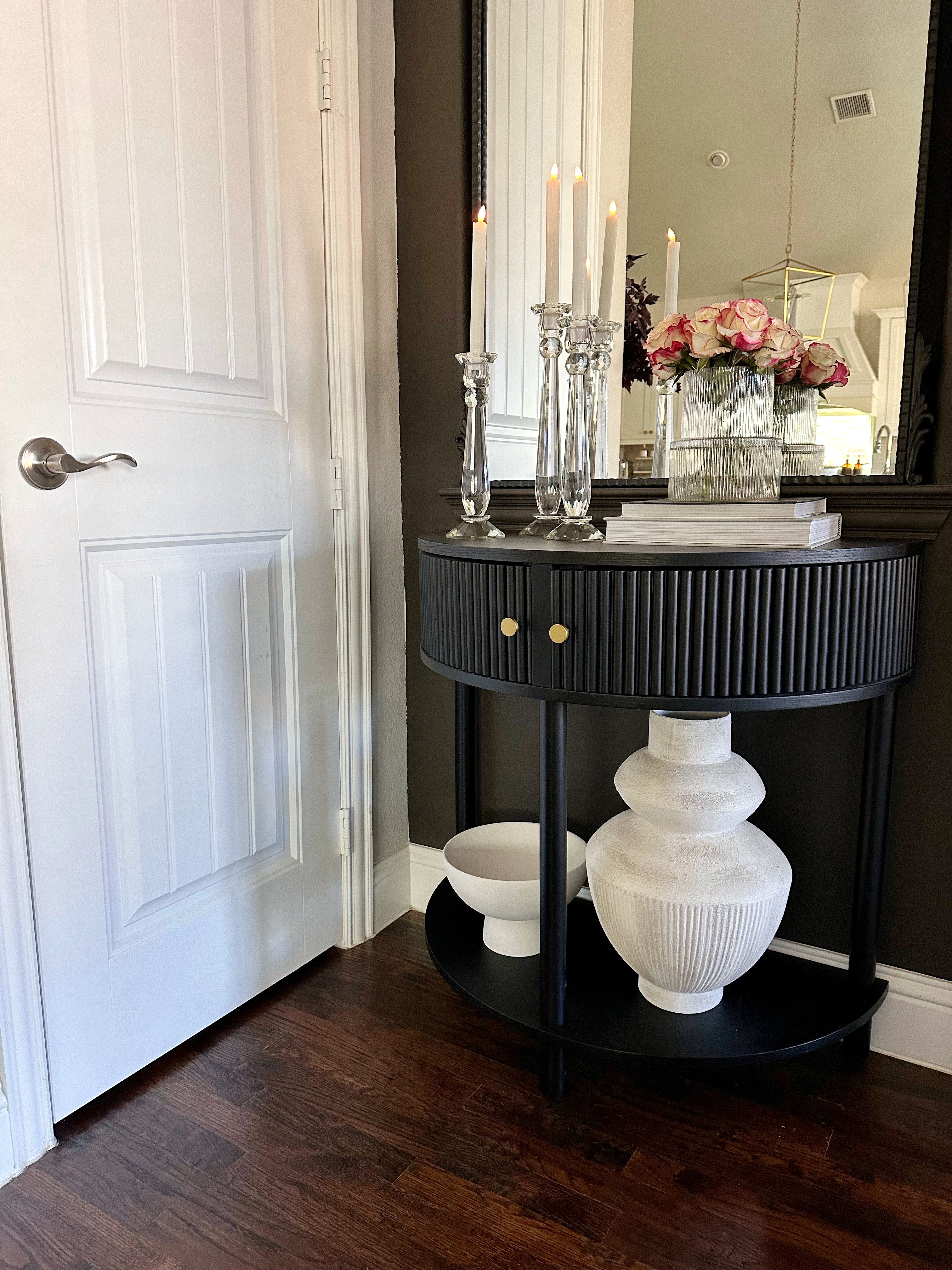 This little half-moon table is currently on sale on wayfair! 

#LTKHome #LTKSaleAlert #LTKStyleTip