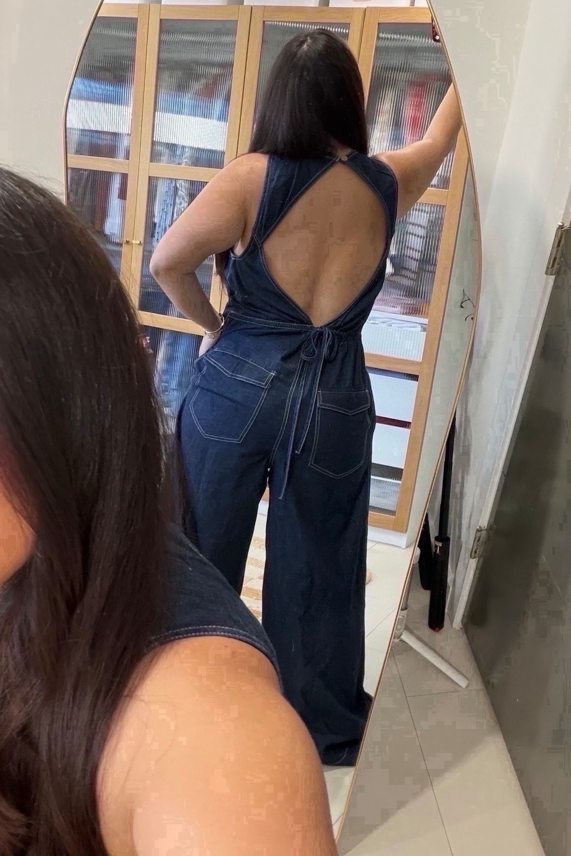 The back of this jumpsuit is EVERYTHING!  Wearing size L



#LTKSeasonal #LTKootd #LTKMidsize