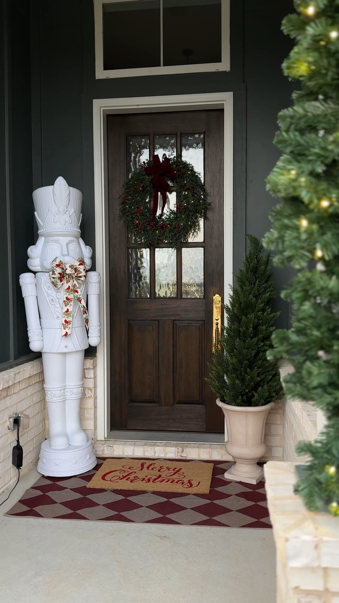 Porch, holiday decor, nutcracker, vase, urn, cedar tree, faux trees, wreath, door hardware, Christmas decor, Christmas outdoor decorations 

#LTKHome #LTKHoliday