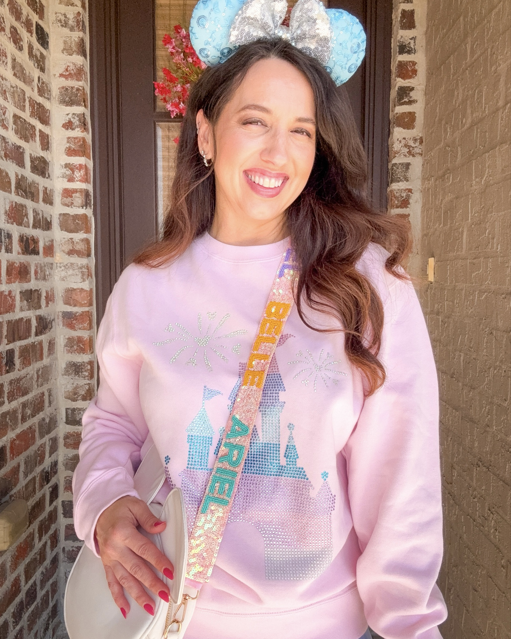 A dream is a wish your heart makes… and I’m choosing to believe in mine ✨ Sparkle like the castle, dress like a princess, and believe in a little magic every day. 

🏰 Crystal Castle Sweatshirt, Princess roll call strap and bag both from @audreylaineco -code DEANN10 
 
💎Cinderella inspired ears by @pineapplesandaloha 

Never stop dreaming, no matter your age 💫 

#LTKBeauty #LTKdayinmylife #LTKTravel