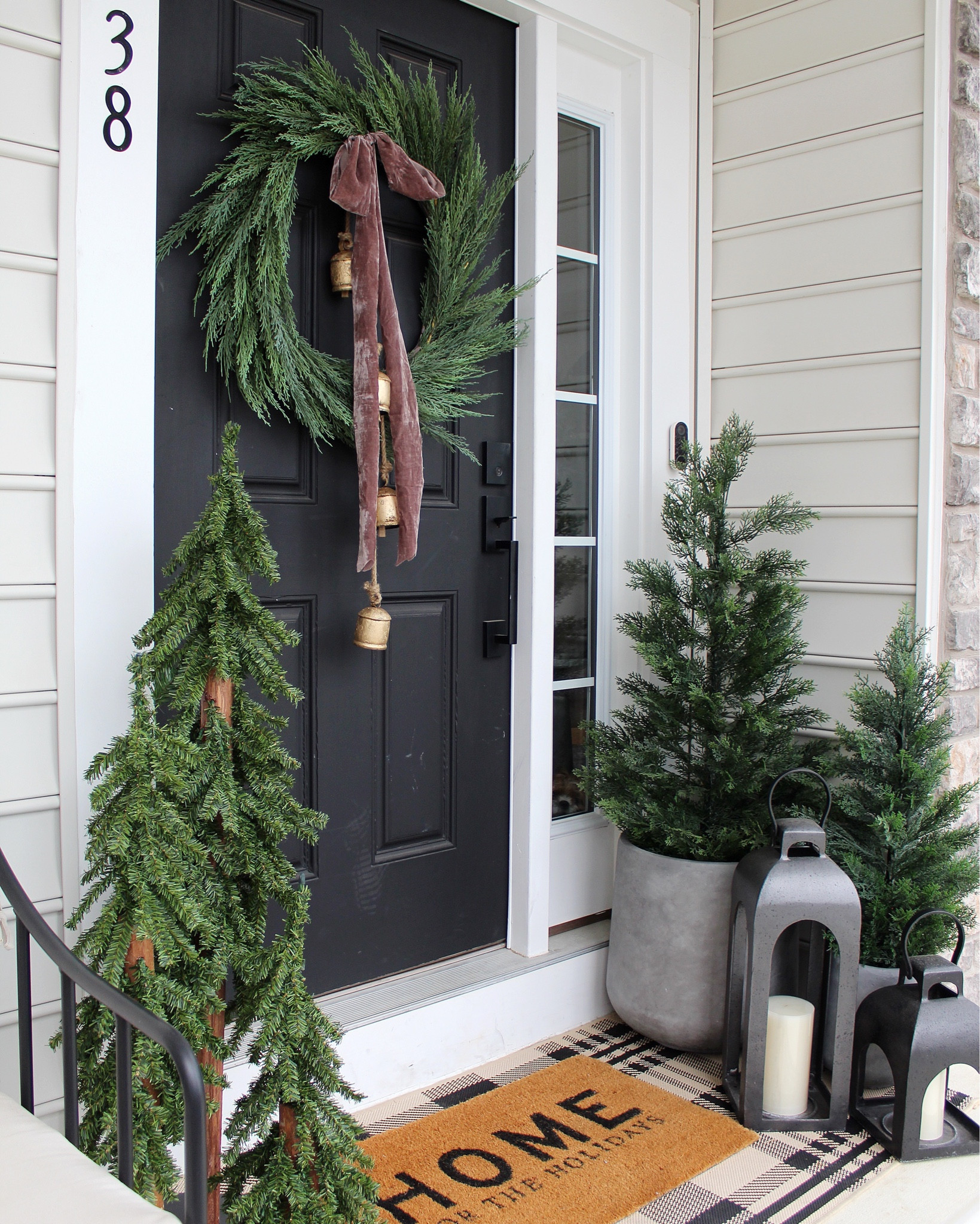 Front porch, planters, rug, doormat, trees, lantern, wreath, bells, ribbon 


#LTKHome #LTKSeasonal #LTKHoliday